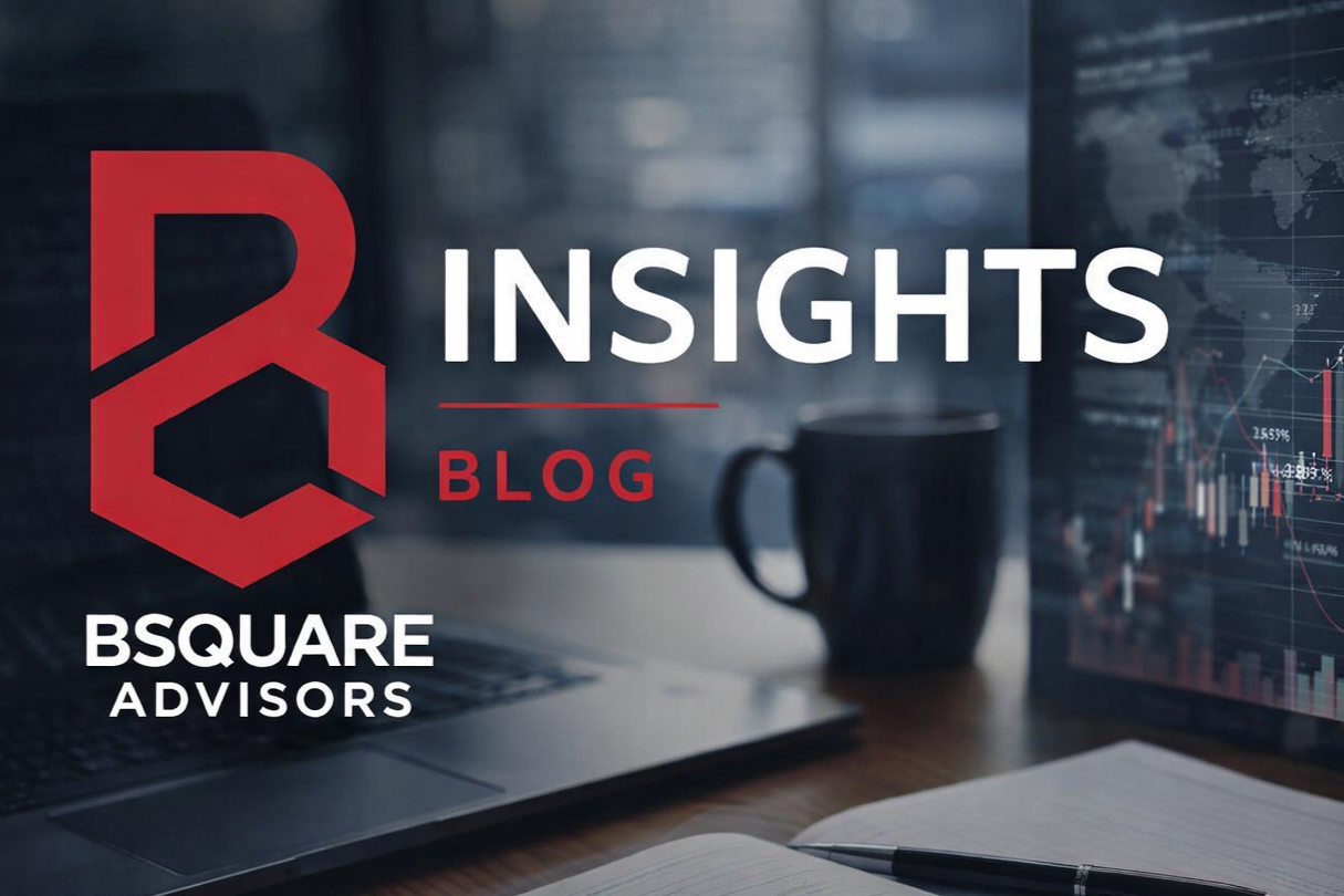 A digital workspace with a laptop, a pen, an open notebook, and a coffee mug in front of a computer monitor displaying financial charts. Overlay text reads 'Insights Blog' with 'BSQUARE Advisors' logo.