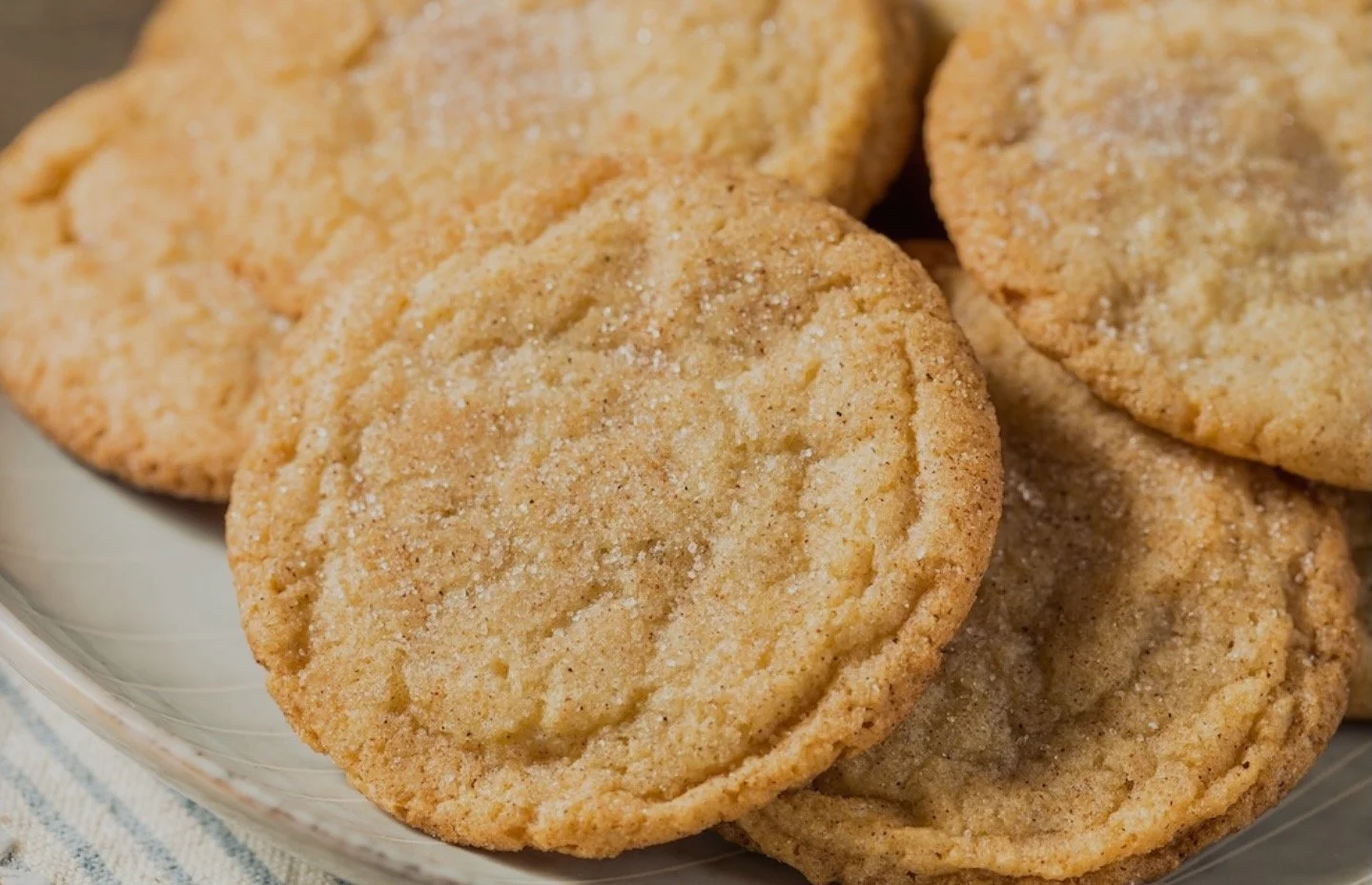 Close-up of several sugar cookies on a plate