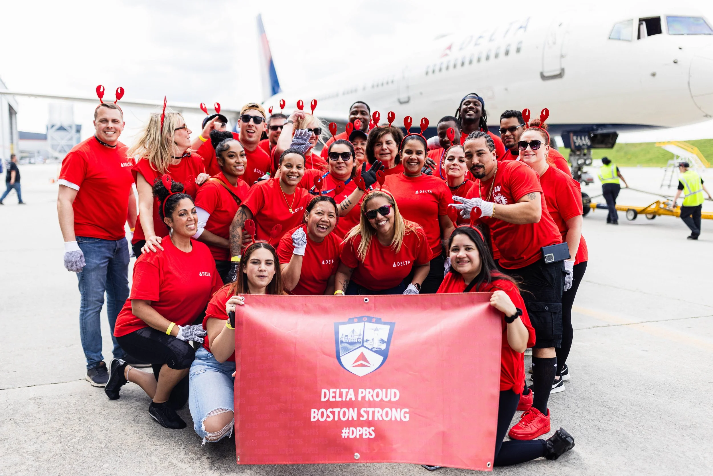 Team celebrating together at a live community event