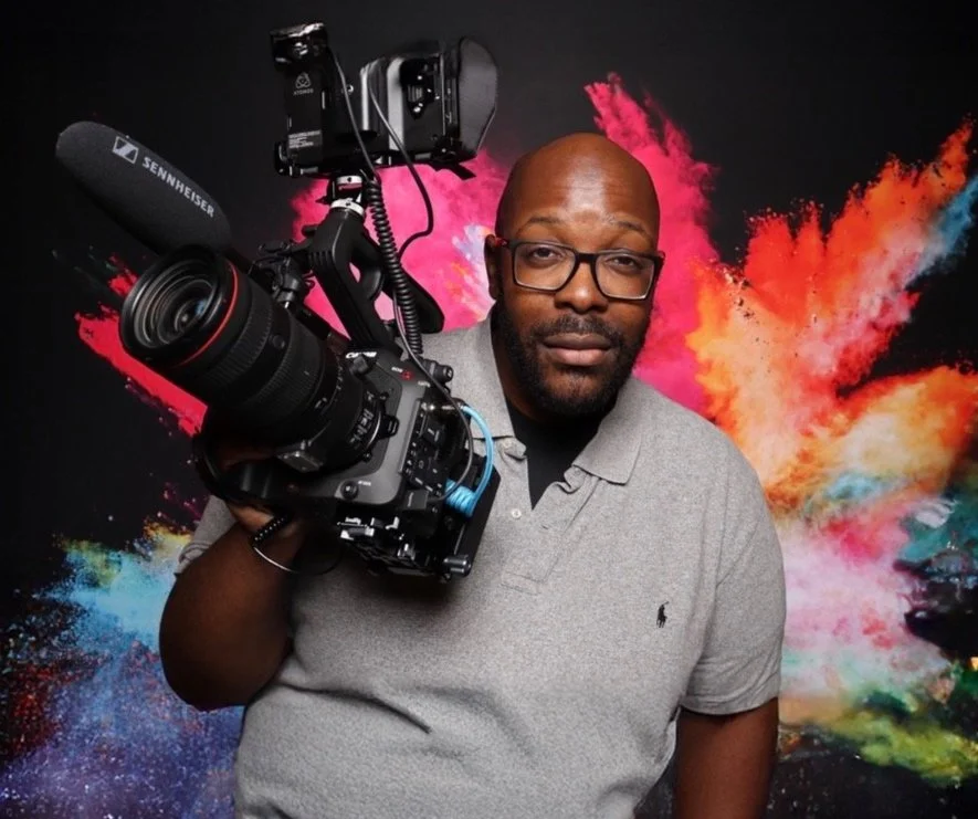 Barry Daley filming with a professional cinema camera