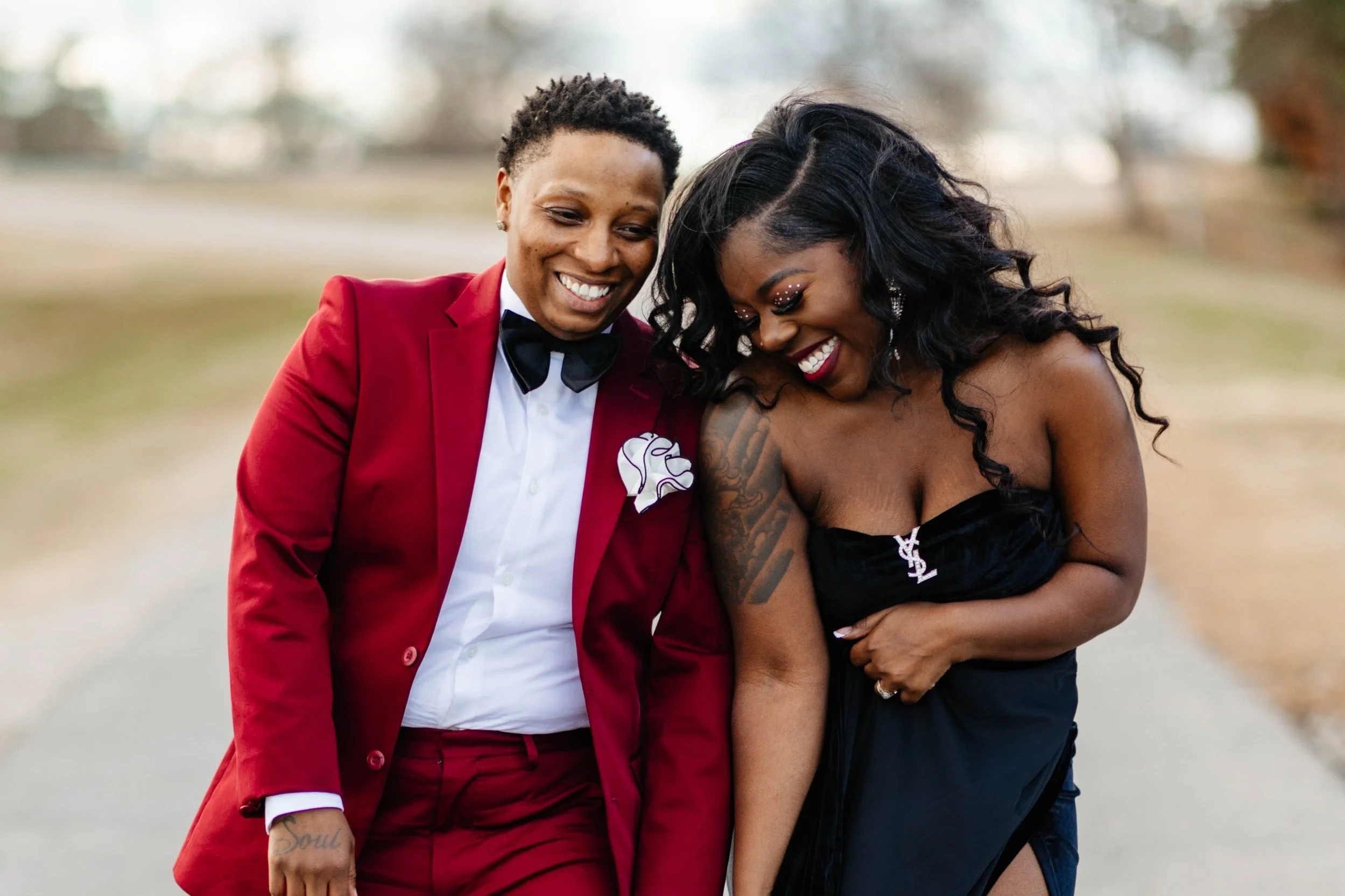 Joyful couple photographed outdoors