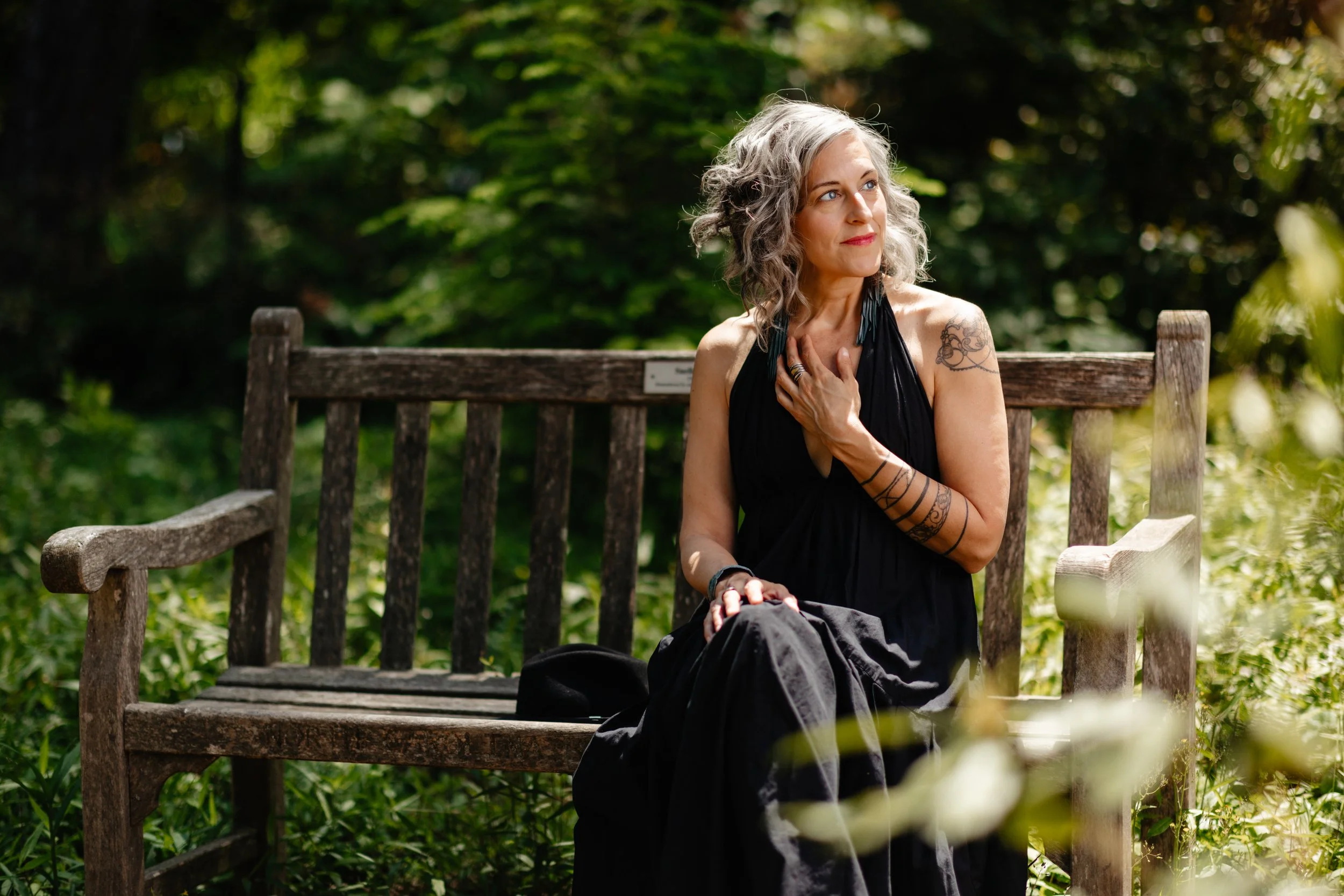Thoughtful lifestyle portrait in a garden setting