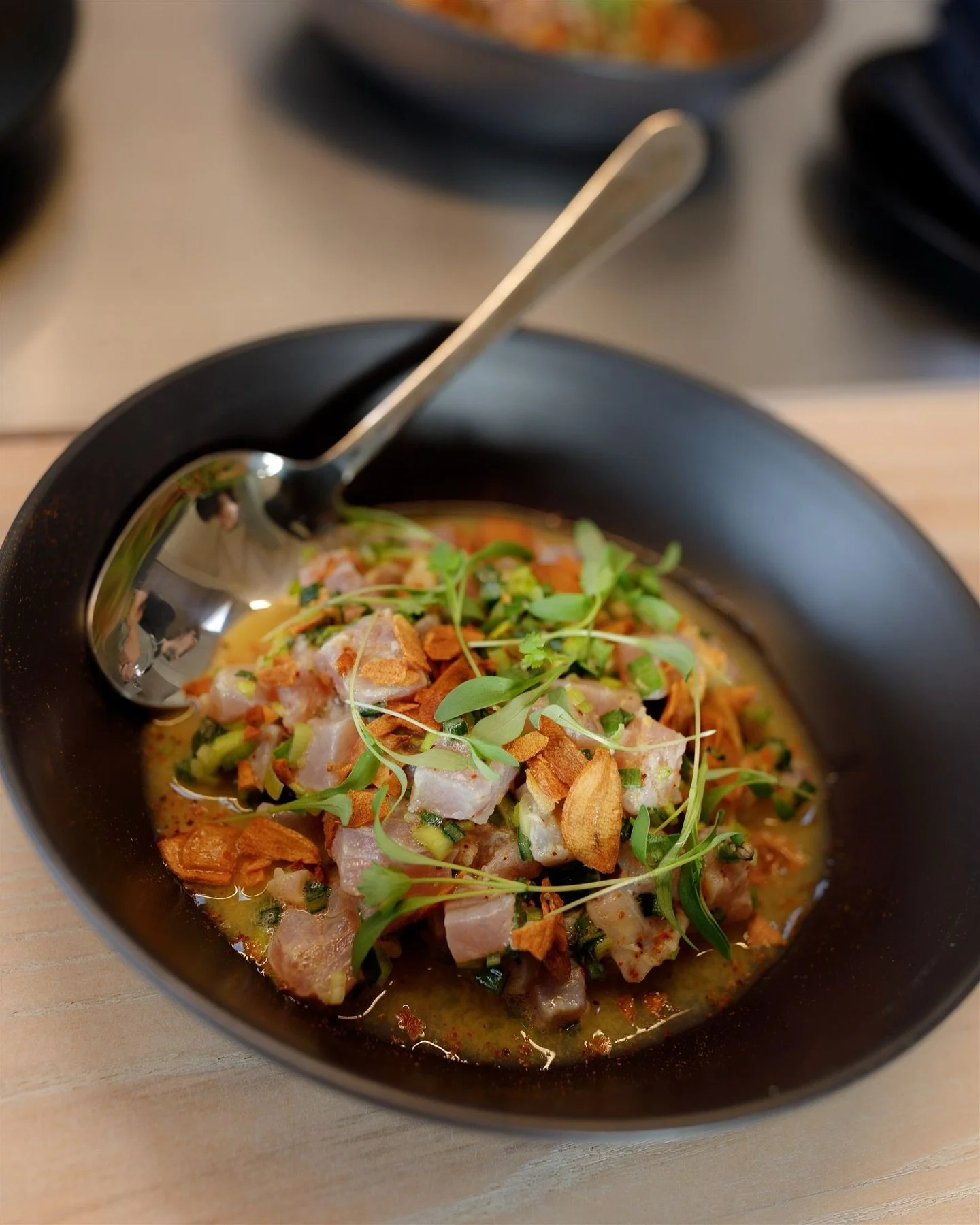 If there is a dish that comes to mind from South American cuisine, it&rsquo;s ceviche, a popular choice for many in our menus.

Kingfish Ceviche, Crispy Garlic &amp; Passion Fruit leche de tigre.

@wildfolkphotography 📸 👌🏽

#waihekechef
#waiheke
#