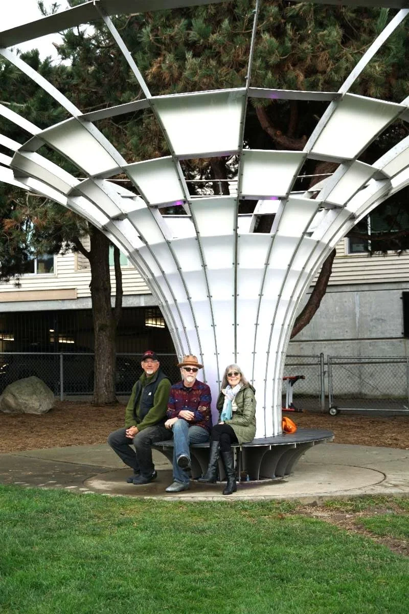 Artist Sean Orlando (center) with lead Engineered Artworks installer Chris Coburn (left) and former Edmonds Arts &amp; Culture Manager Frances Chapin (right).