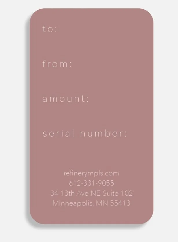 A pink gift card or label with fields for 'to,' 'from,' 'amount,' and 'serial number,' along with contact information for refinarympls.com and a phone number, located on 3413th Ave NE in Minneapolis.
