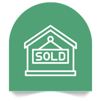 A real estate sign with a house outline and the word 'SOLD' in the middle