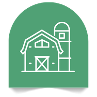 Outline of a barn with a silo on a green background