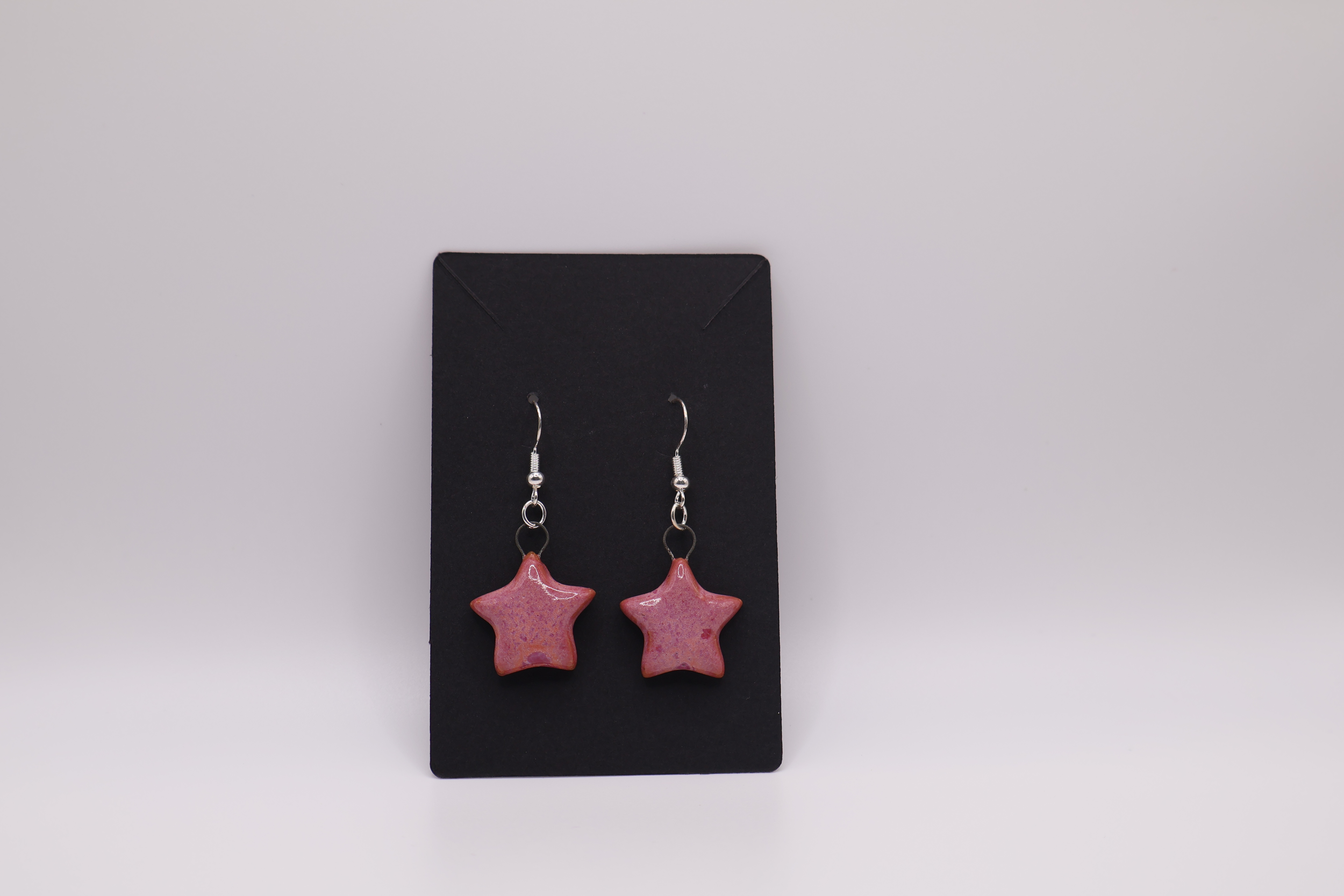 pink earrings star.png