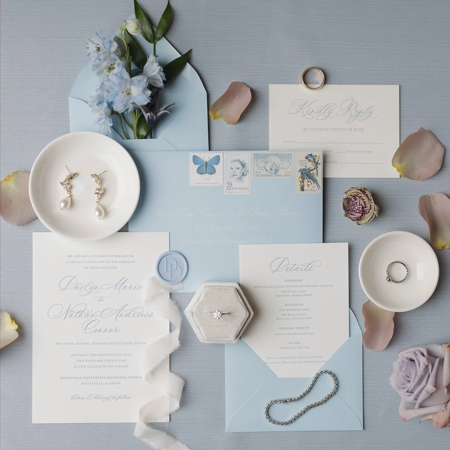 The collection of beautiful details for Daelyn and Drew&rsquo;s big day 🩵✨

Wedding Planning + Design | @milliejamesweddings 
Photography | @skylarlienphoto 
Florist | @poemofpetals 
Stationery | @sawyerstudio.co 
Ceremony Location | @huntsvillefirs