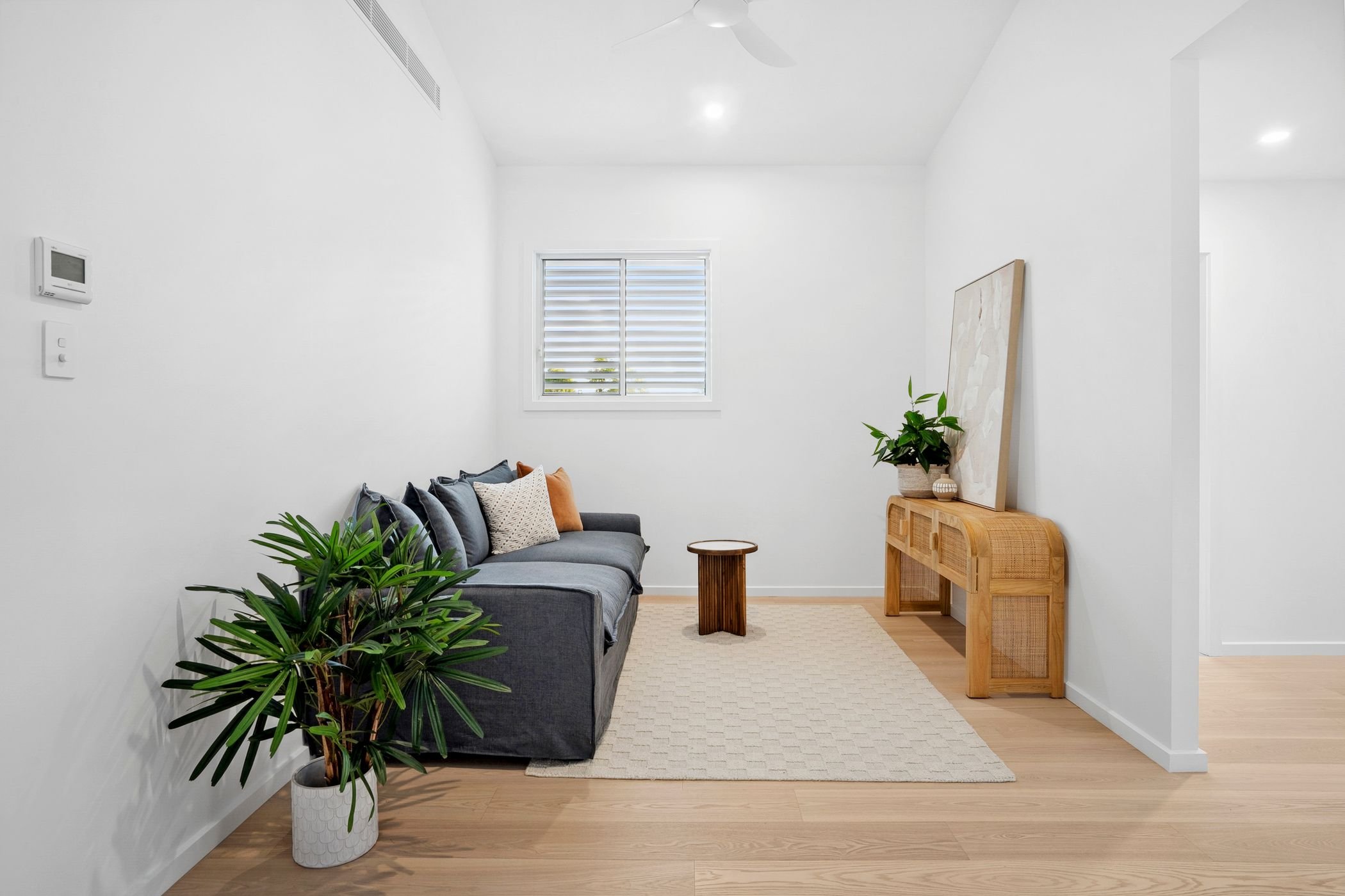 Boutique duplex project in Port Macquarie features light, airy and minimalist second living room space.