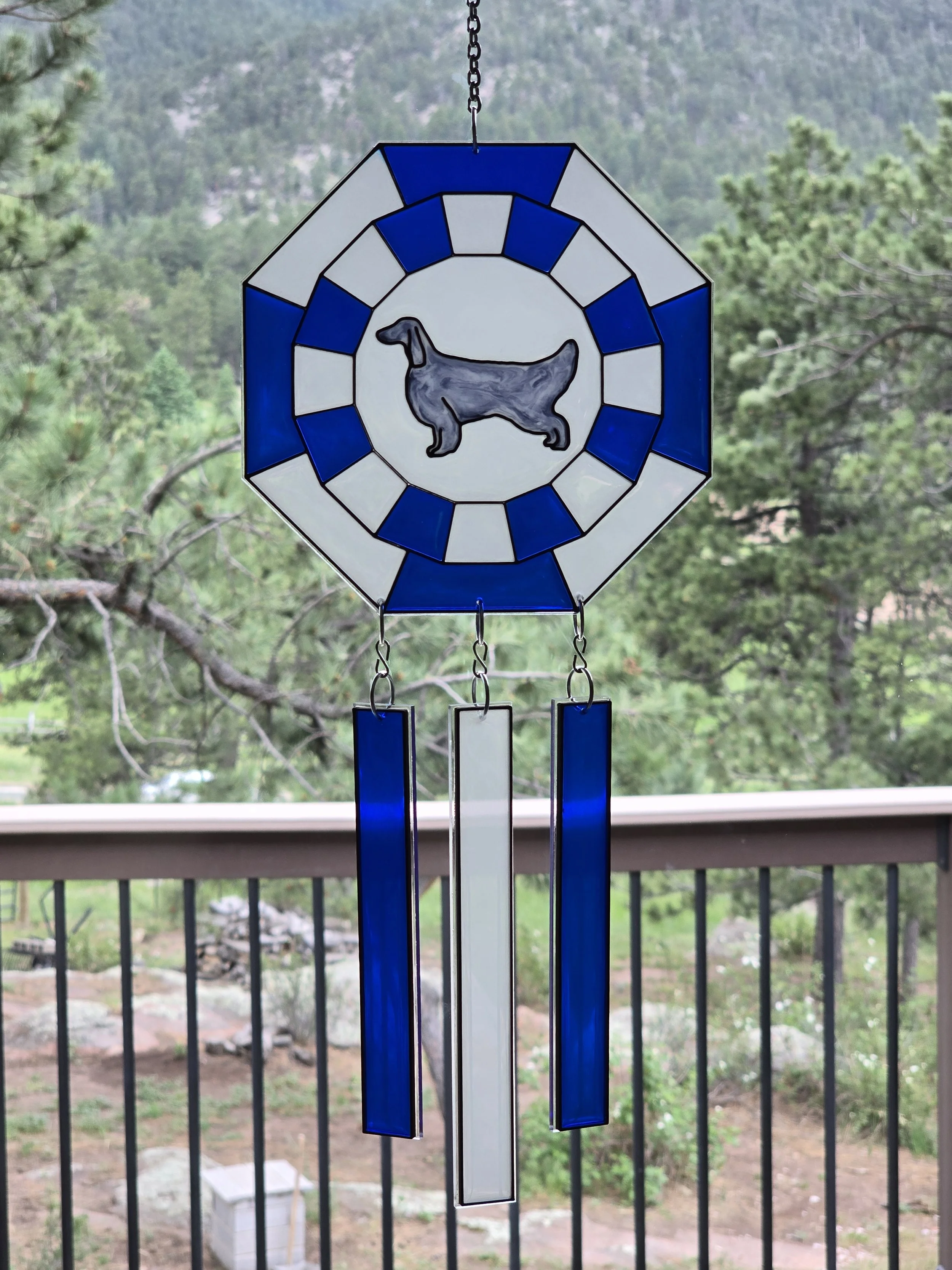 Blue and white resin rosette suncatcher with an English Setter silhouette and blue and white resin ribbons
