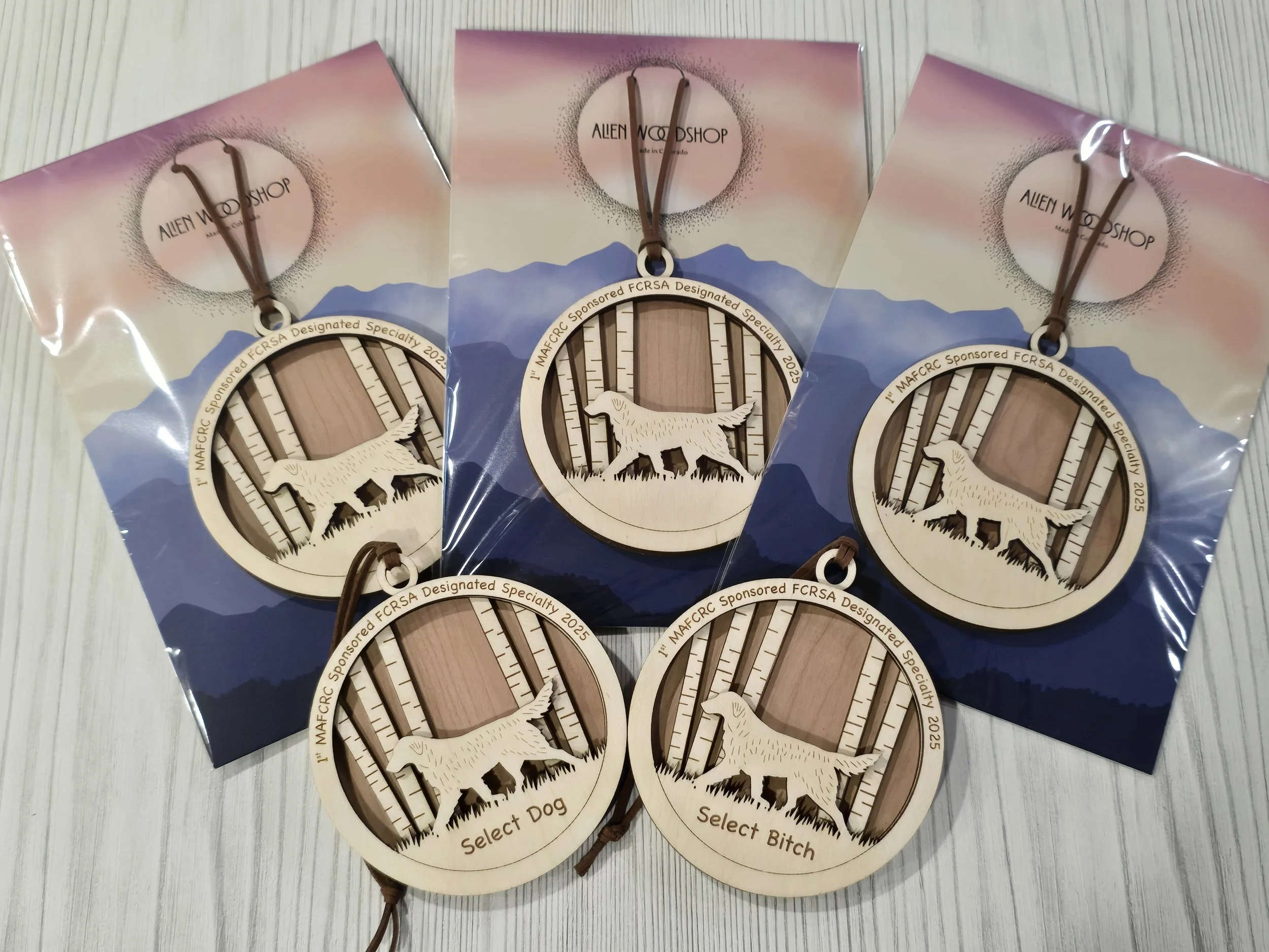 Packaged wood ornaments engraved 1st MAFCRC Sponsored FCRSA Designated Specialty, Select Dog and Select Bitch