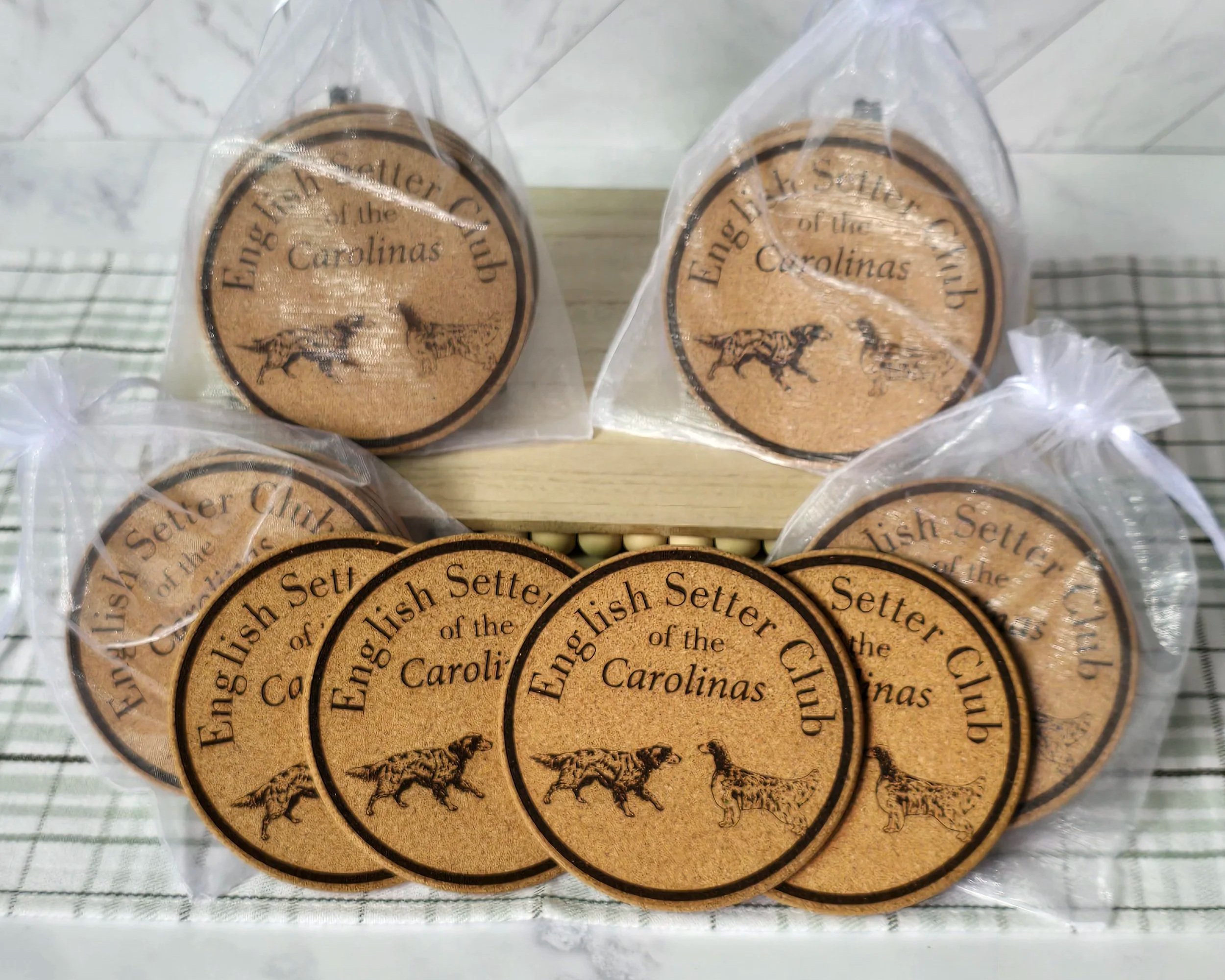 Round cork coasters engraved English Setter Club of the Carolinas, bagged in organza
