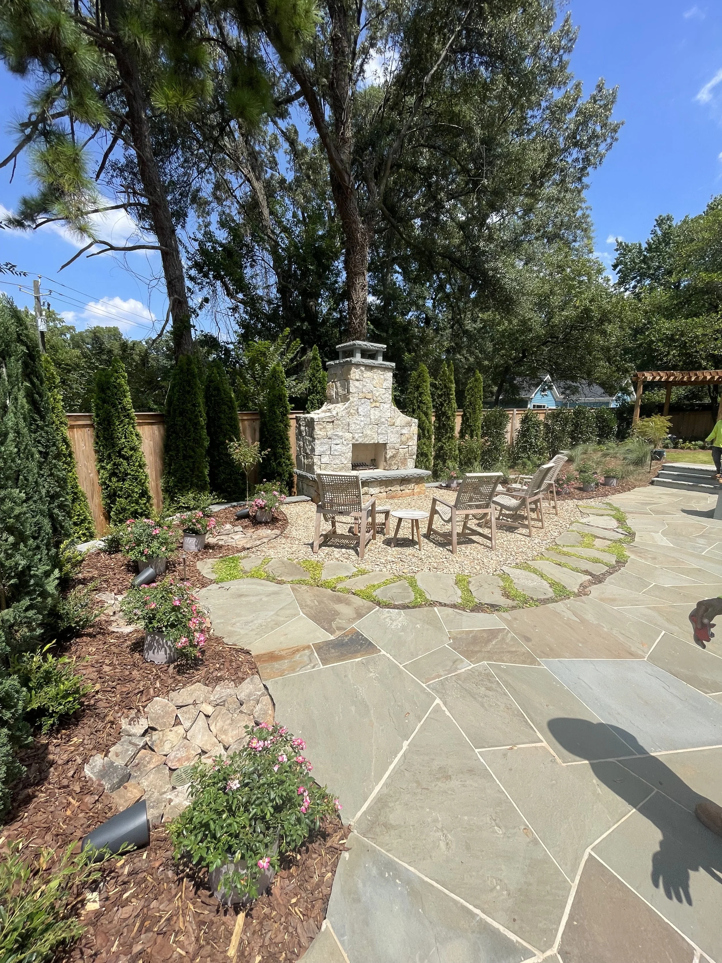 A poolside fireplace built in Fulton County