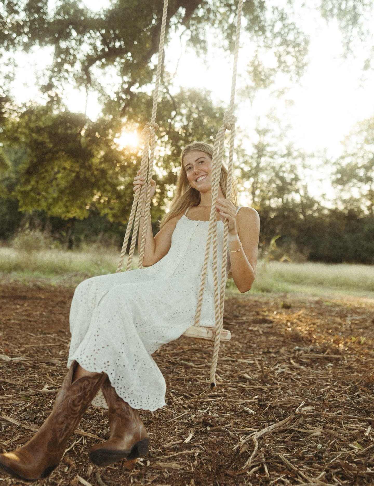 Somehow this spot always feels a little bit magical. Our rope swing is tucked right between the trees and makes the sweetest backdrop for golden hour sessions &mdash; especially when the light hits just right.

Booking now for summer + early fall ses