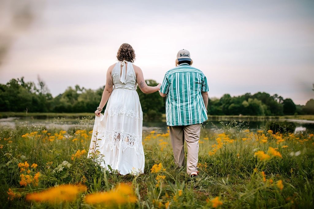 Soft yellow wildflowers tucked along the edge of the lake, just enough water peeking through, and the kind of open space that lets moments unfold naturally. It&rsquo;s simple, peaceful, and so effortlessly beautiful right now.

Booking now for spring