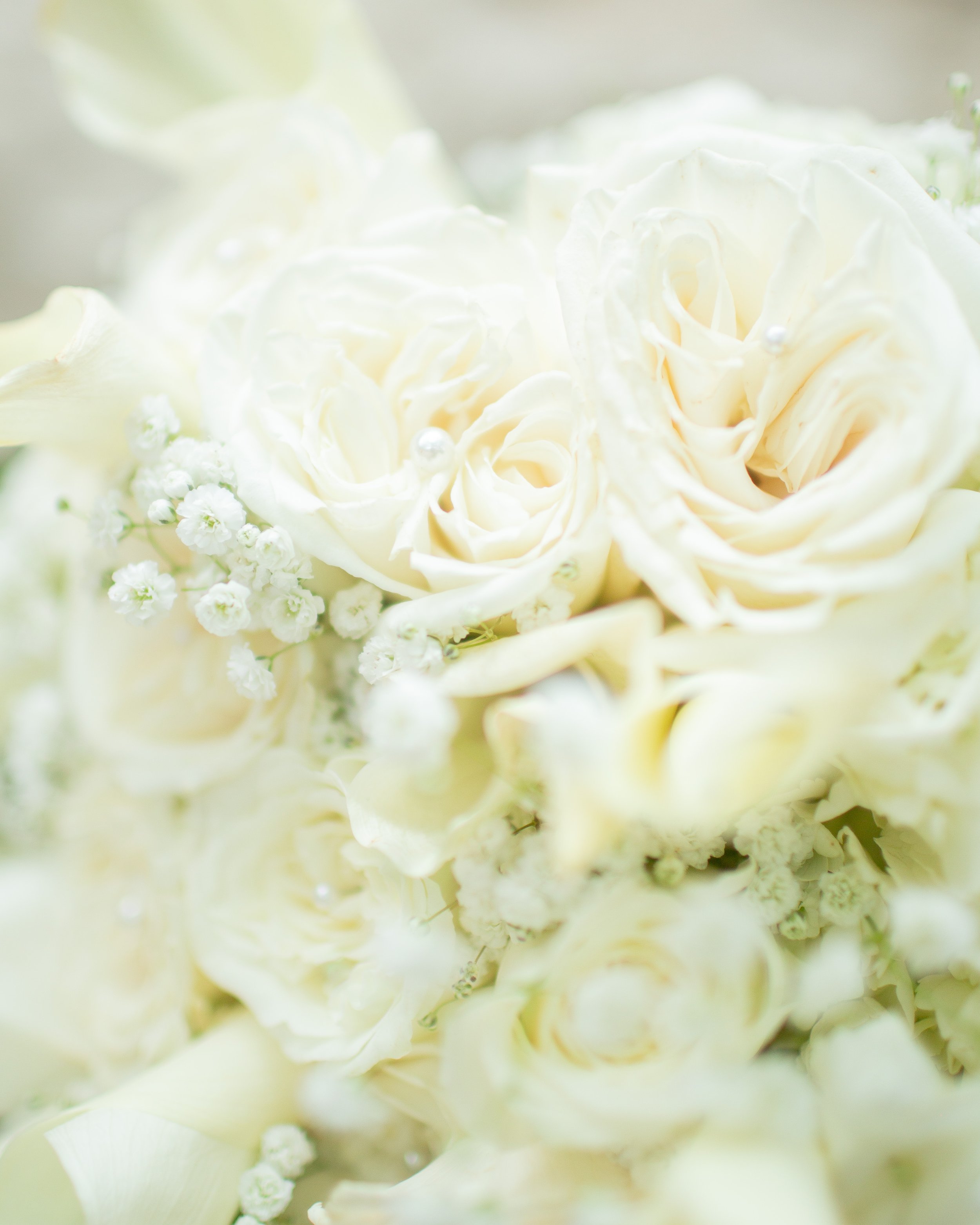 All-white bridal bouquet by Sofi's Secret Garden photographed at a wedding in Houston, TX