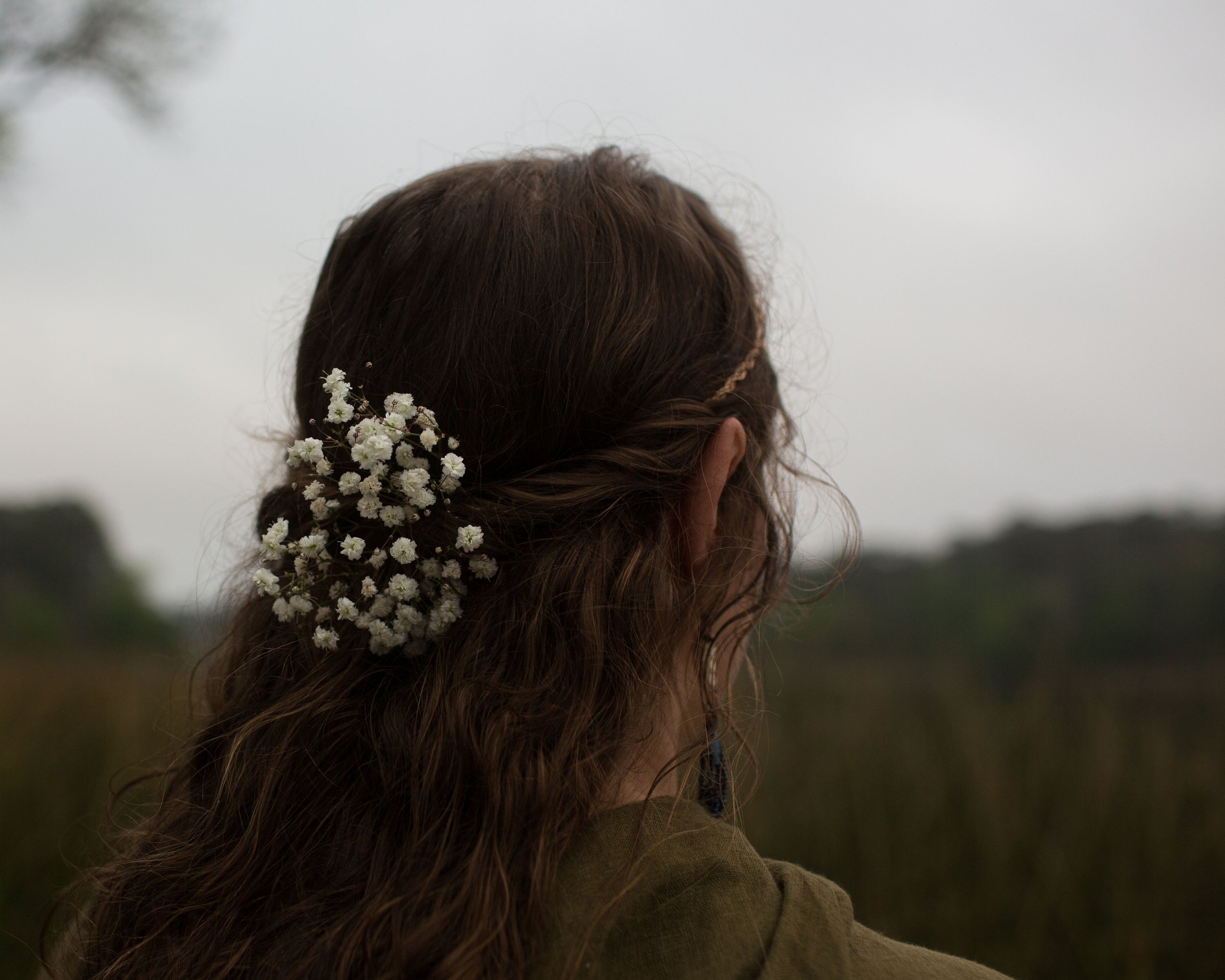 Fantasy portrait of woman in a cloak photographed in Huntsville, TX