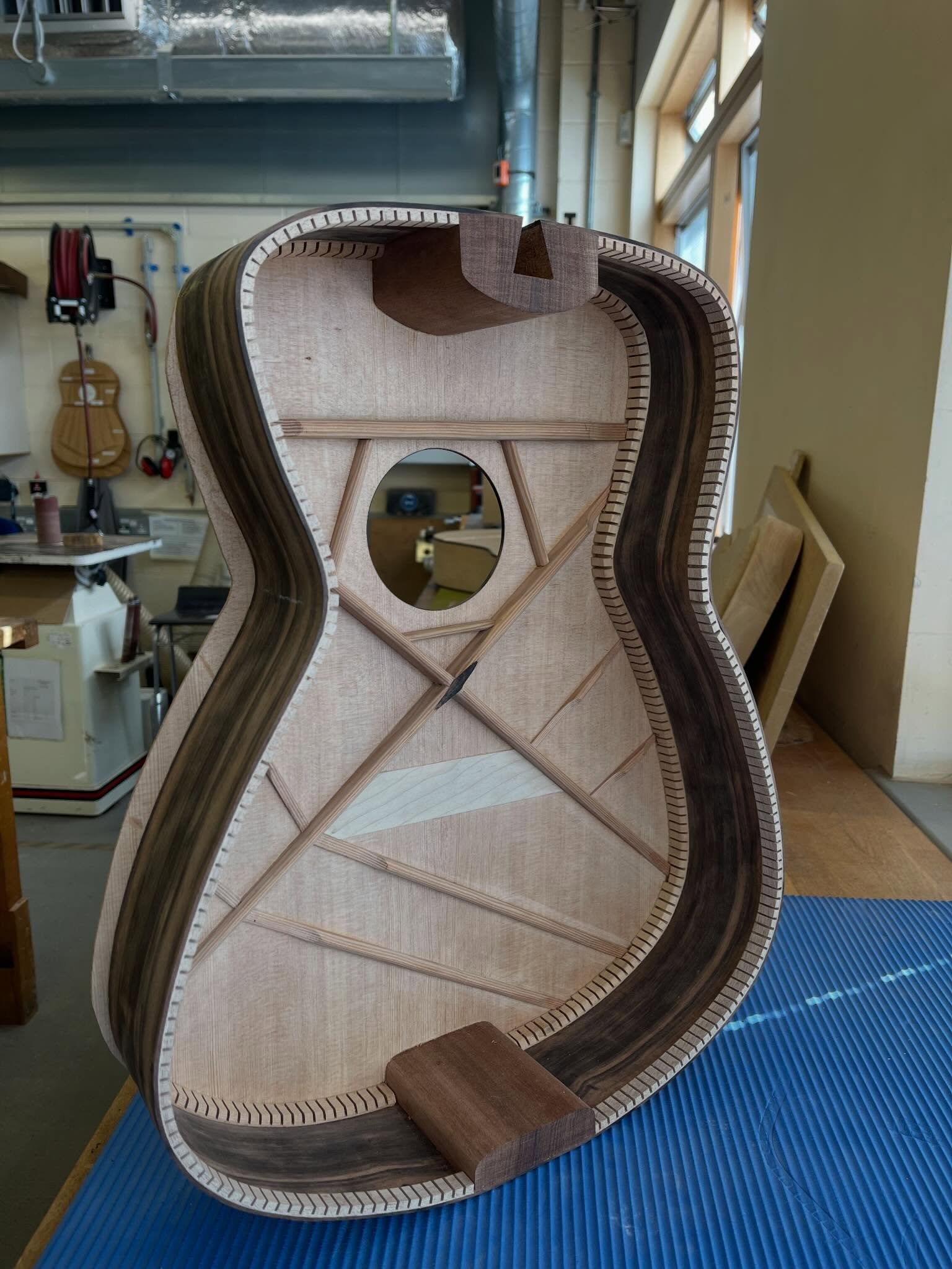 Making some good progress on the acoustic build. Last week I got the top glued on (basically using every clamp in the shop!) and got the dovetail joint done and ready for the neck. It&rsquo;s really starting to come together. The bracing looks so nic