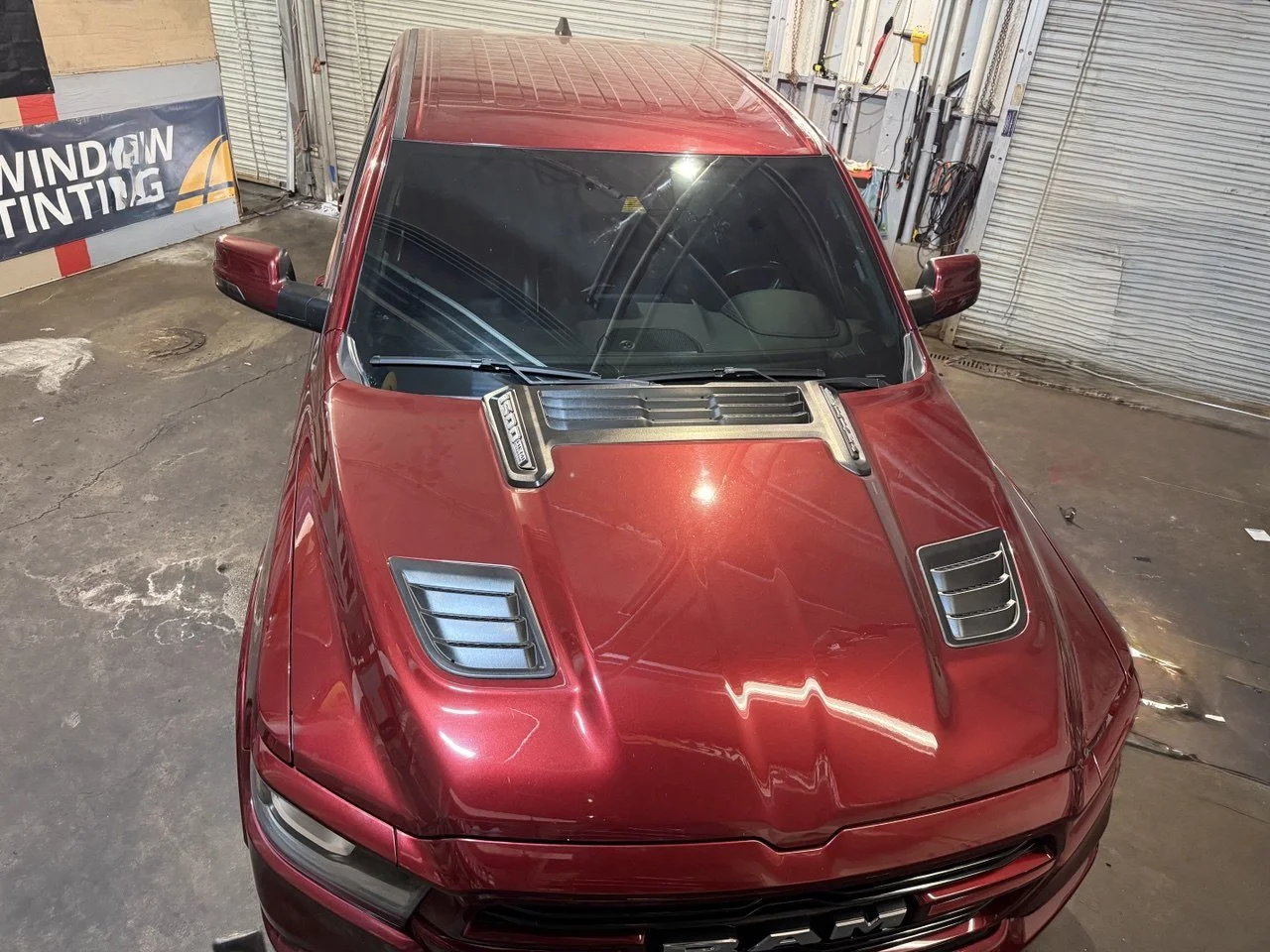 Installing ceramic IR window tint on front door glass – professional tint installation at Oceanside Tint & Glass