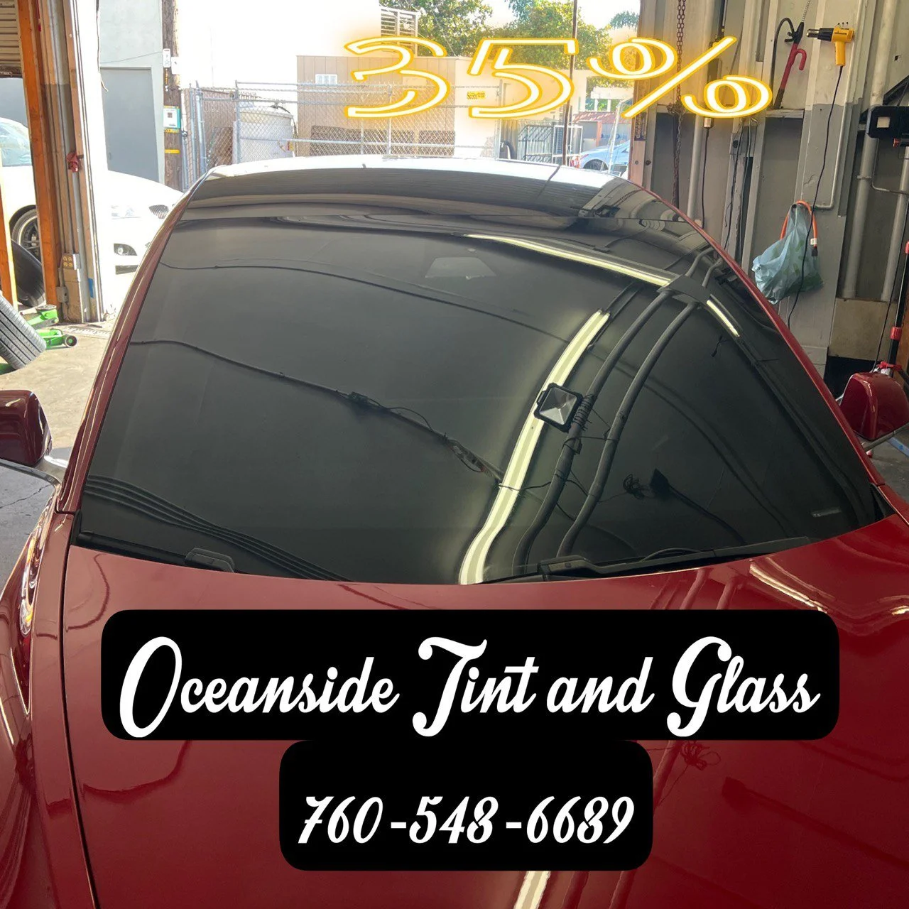 Installing ceramic IR window tint on front door glass – professional tint installation at Oceanside Tint & Glass