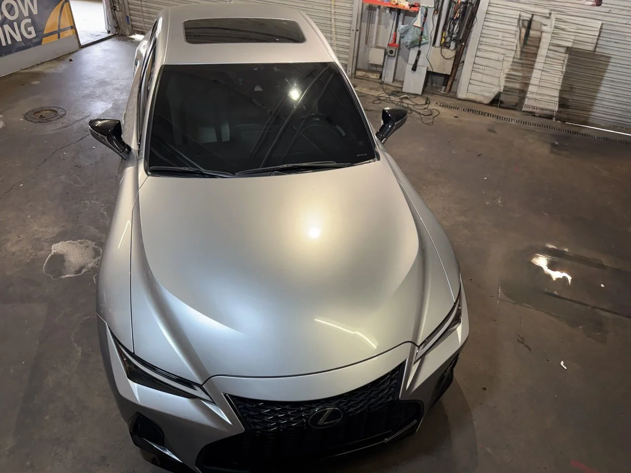 Installing ceramic IR window tint on front door glass – professional tint installation at Oceanside Tint & Glass