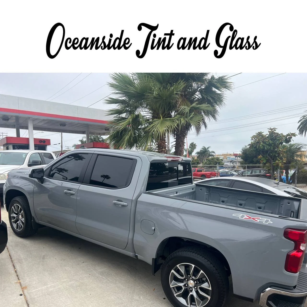 Installing ceramic IR window tint on front door glass – professional tint installation at Oceanside Tint & Glass