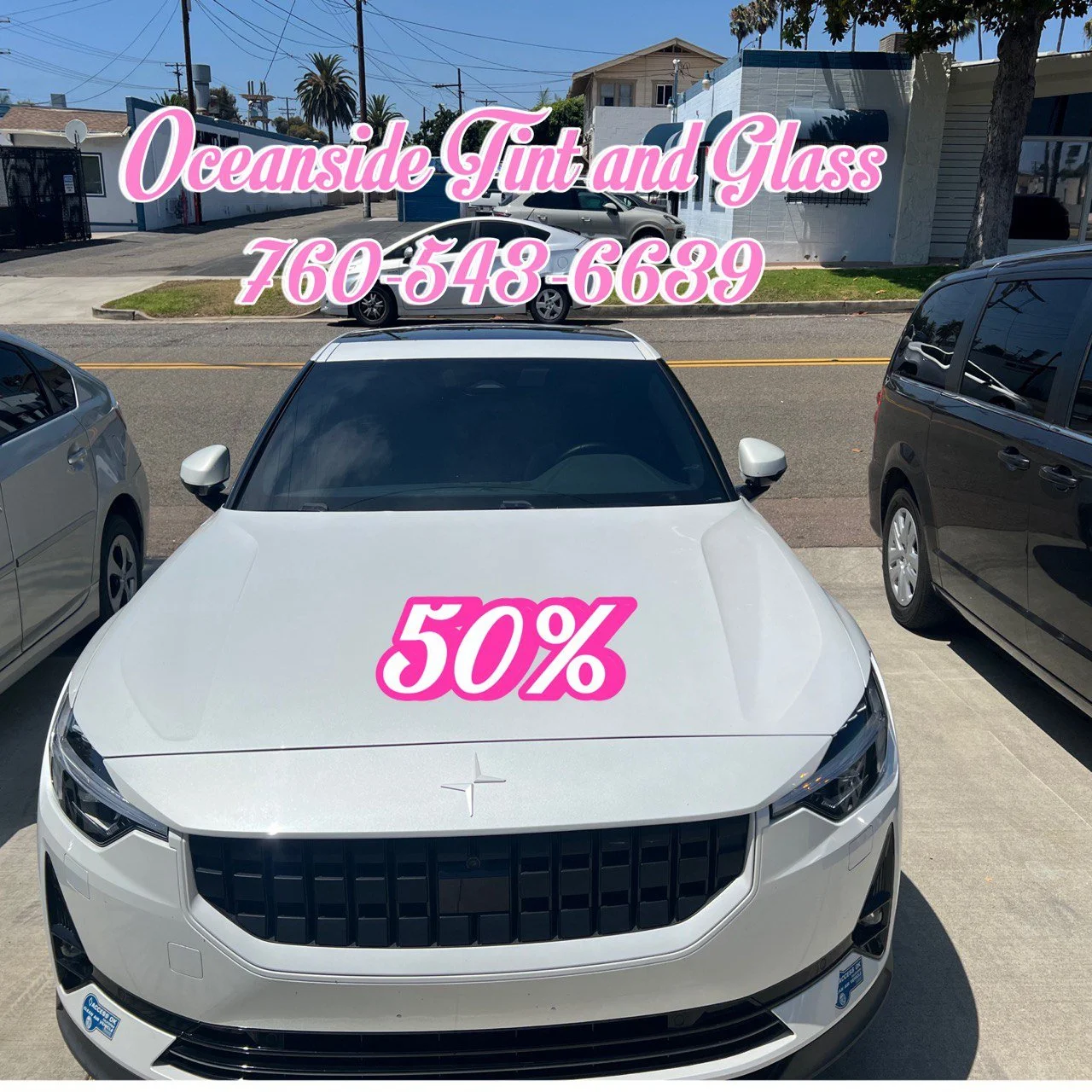 Installing ceramic IR window tint on front door glass – professional tint installation at Oceanside Tint & Glass