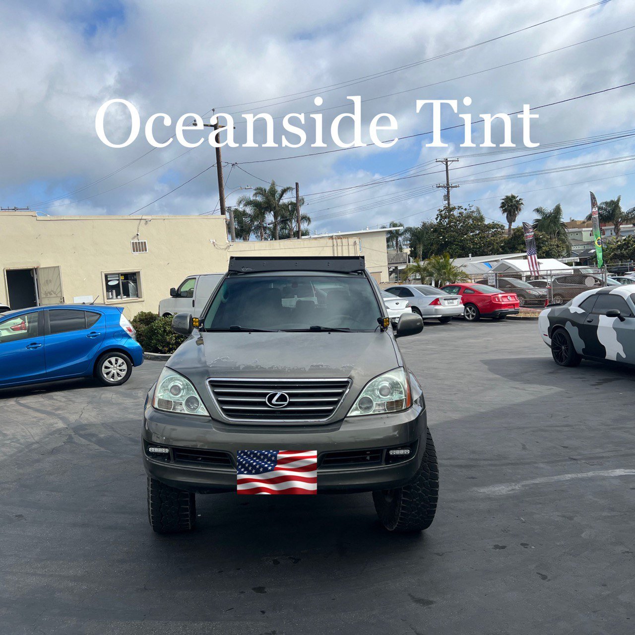 Installing ceramic IR window tint on front door glass – professional tint installation at Oceanside Tint & Glass