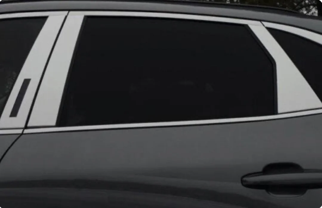 Installing ceramic IR window tint on front door glass – professional tint installation at Oceanside Tint & Glass