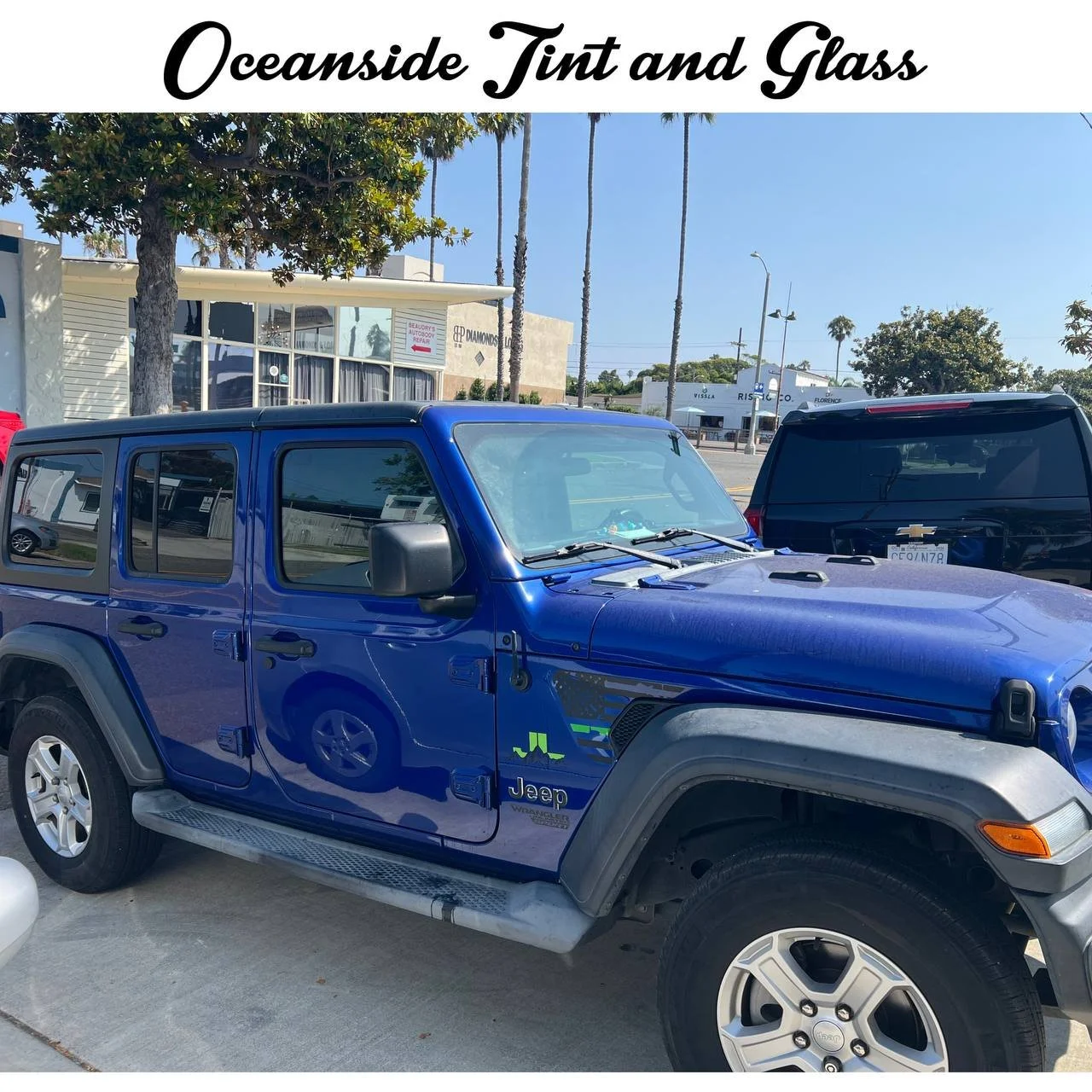 Installing ceramic IR window tint on front door glass – professional tint installation at Oceanside Tint & Glass