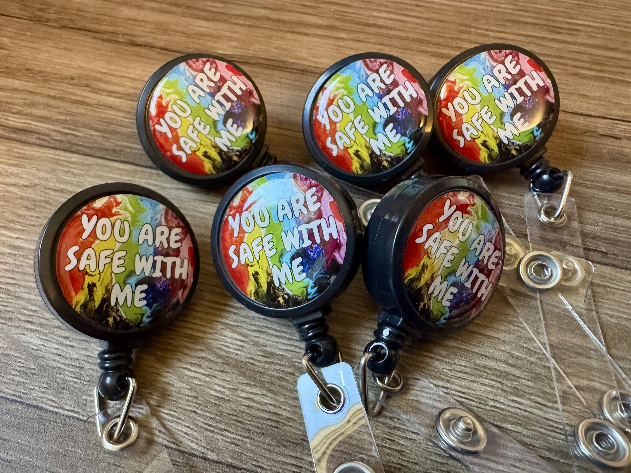 B-Grade You are Safe With Me Badge Reel - Progress Pride and Trans Pride - AbstractbyRabrams - SQ0604790