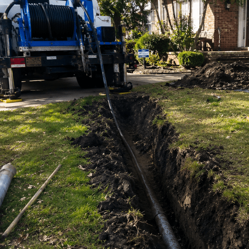 backyard comparison of dug trench versus small access pits