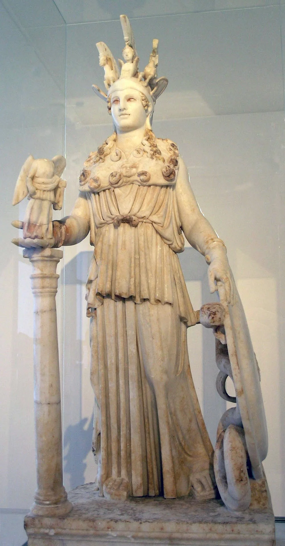 Small Roman-era statuette of Athena Parthenos with shield, snake, and Nike.