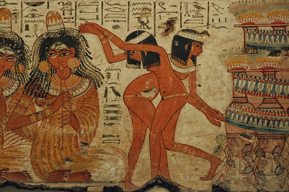 Wall painting with female musicians and dancers at a banquet, Theban tomb, New Kingdom.