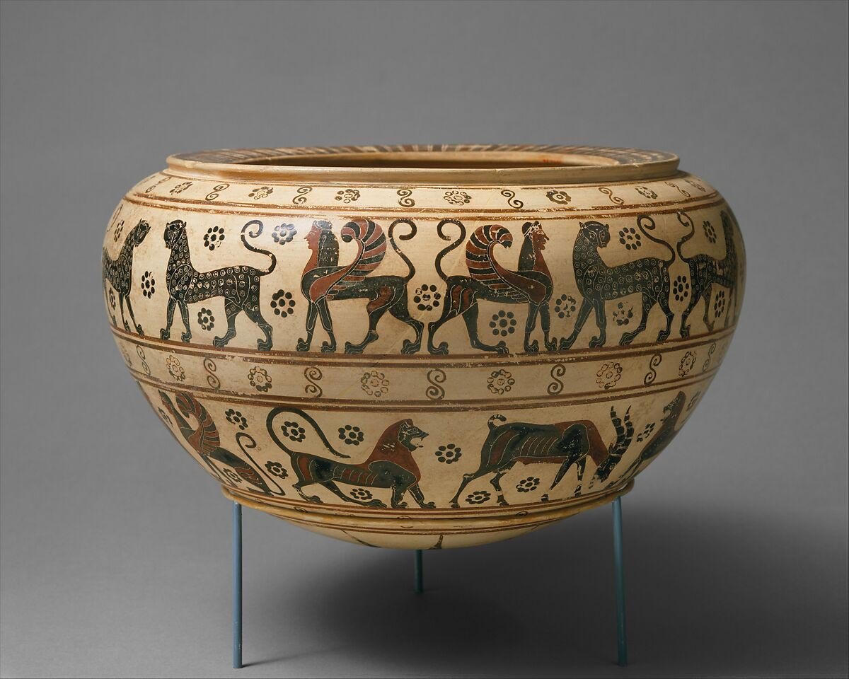 Orientalizing Greek bowl with painted lions, sphinxes and grazing animals marching in friezes around the rounded body.