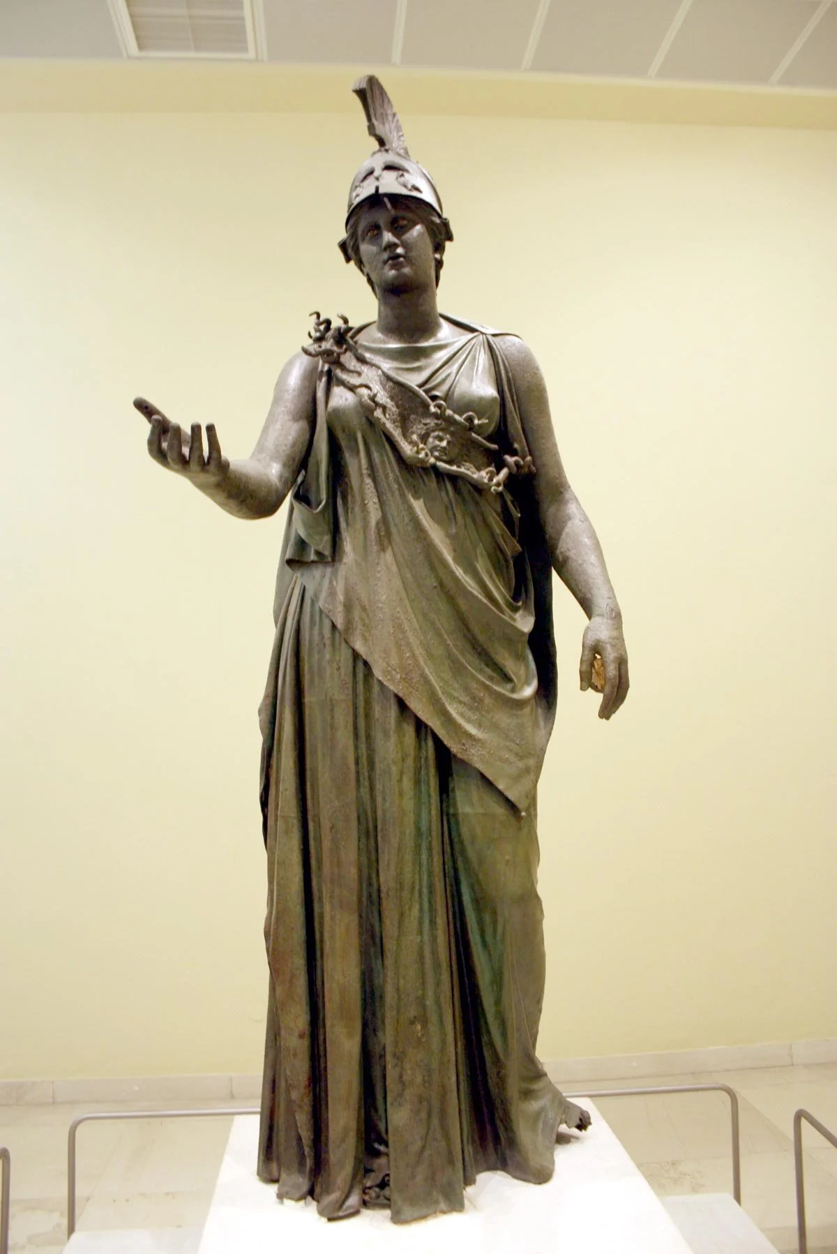 Full bronze statue of Athena wearing a helmet and standing in a commanding pose.