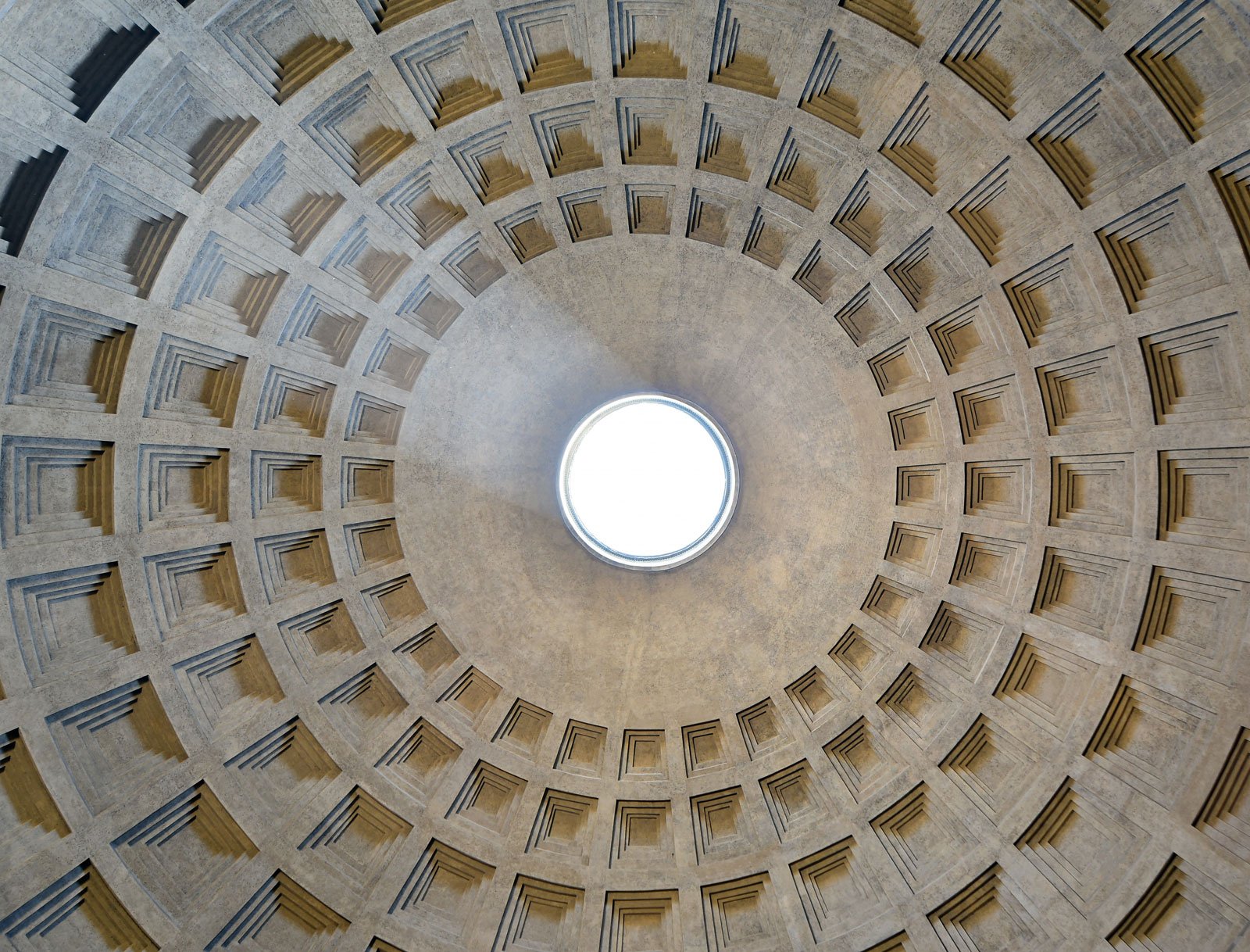 Upward view of the Pantheon dome interior with coffers and the central oculus.