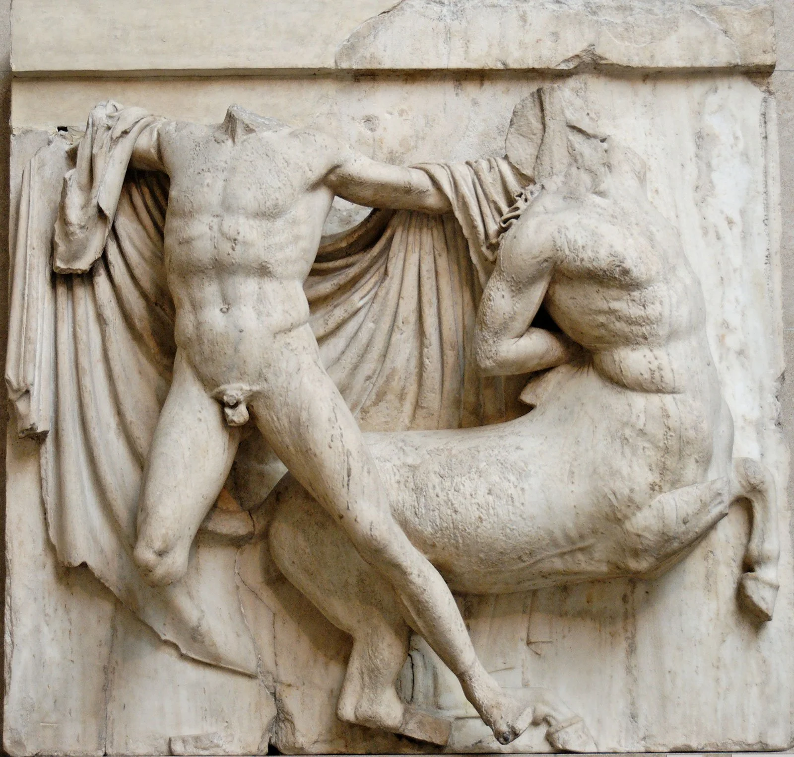 Marble Parthenon metope showing a Lapith fighting a centaur.