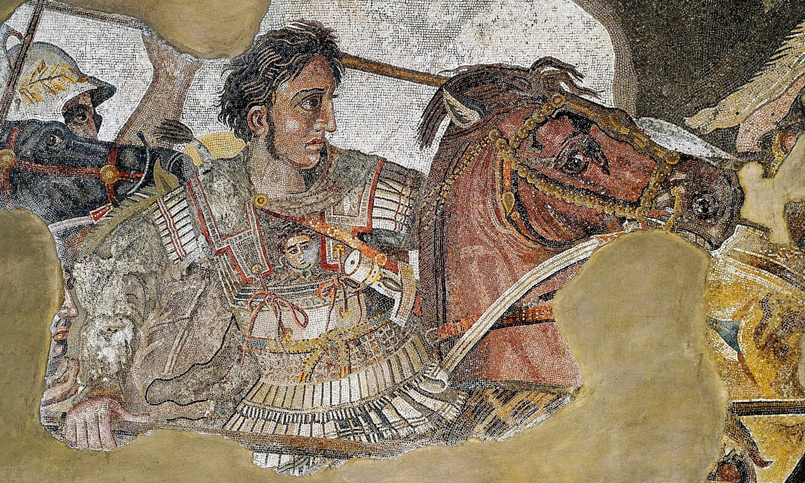 Mosaic detail showing Alexander the Great in battle beside a rearing horse.