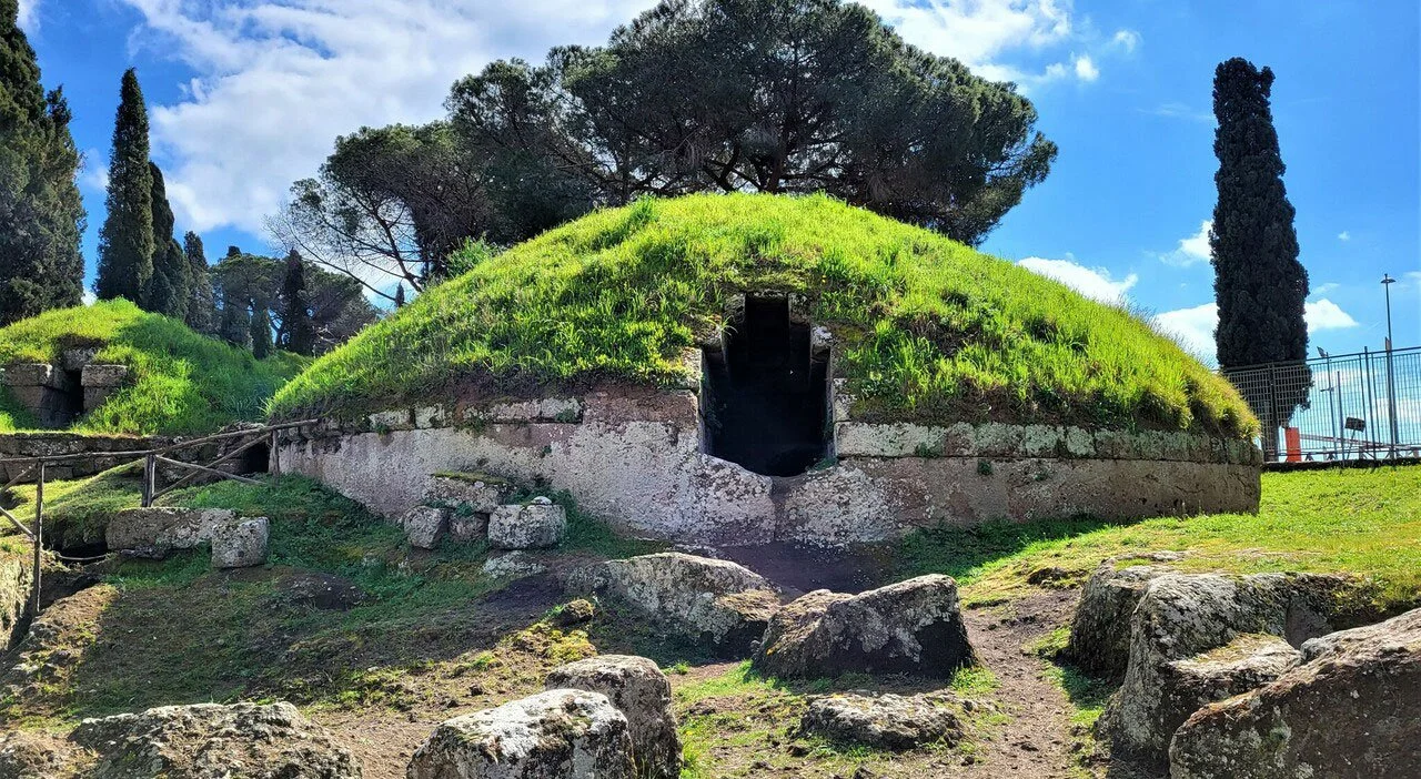 Grassy tumulus tombs at Cerveteri seen from above with paths running between them.