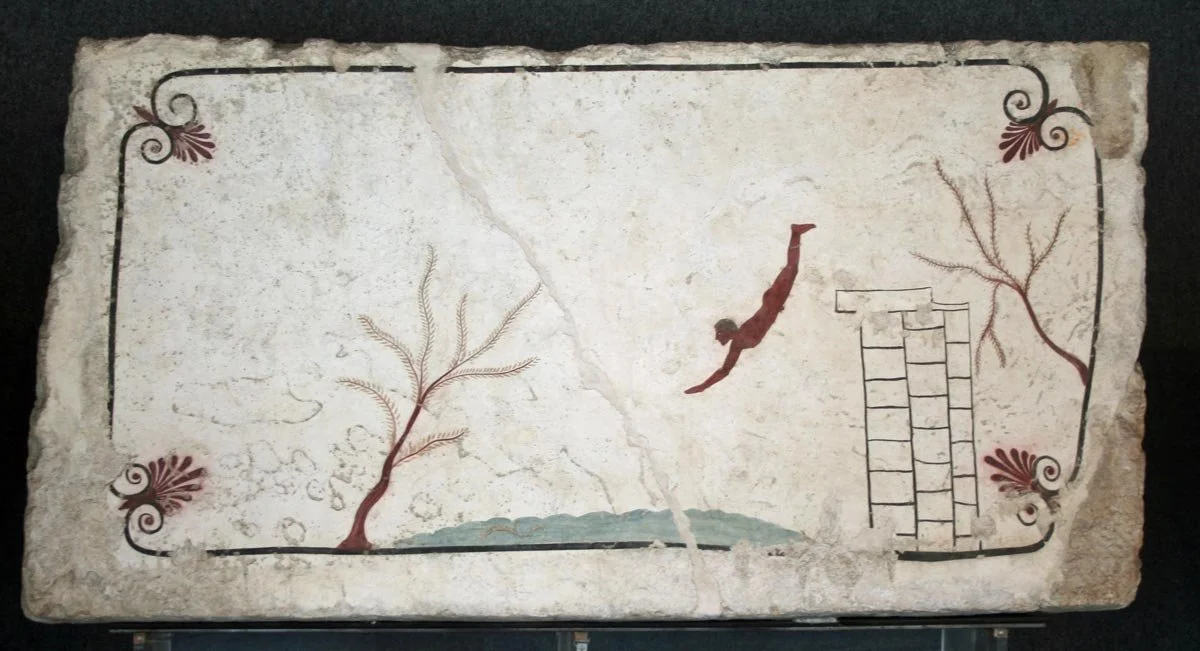 Funerary slab from Tomb of the Diver in Paestum, showing nude figure plunging into water between stylised trees.