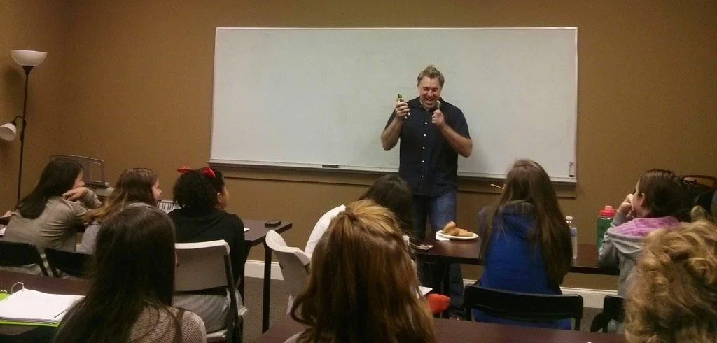 Shane Adams teaching a songwriting class