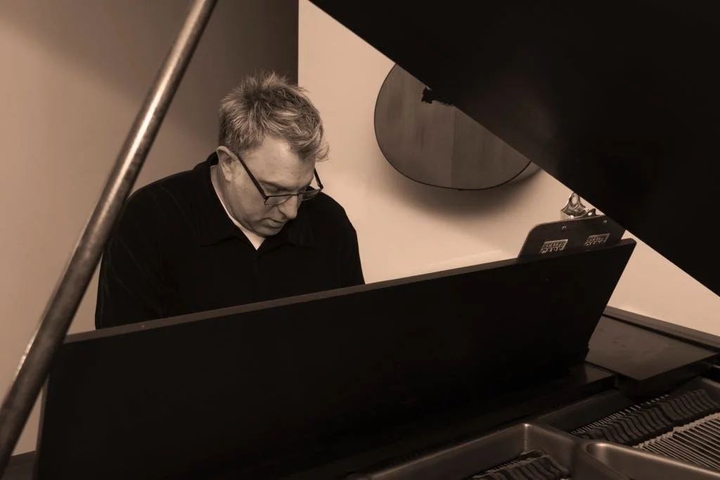 Shane Adams playing a Knabe piano