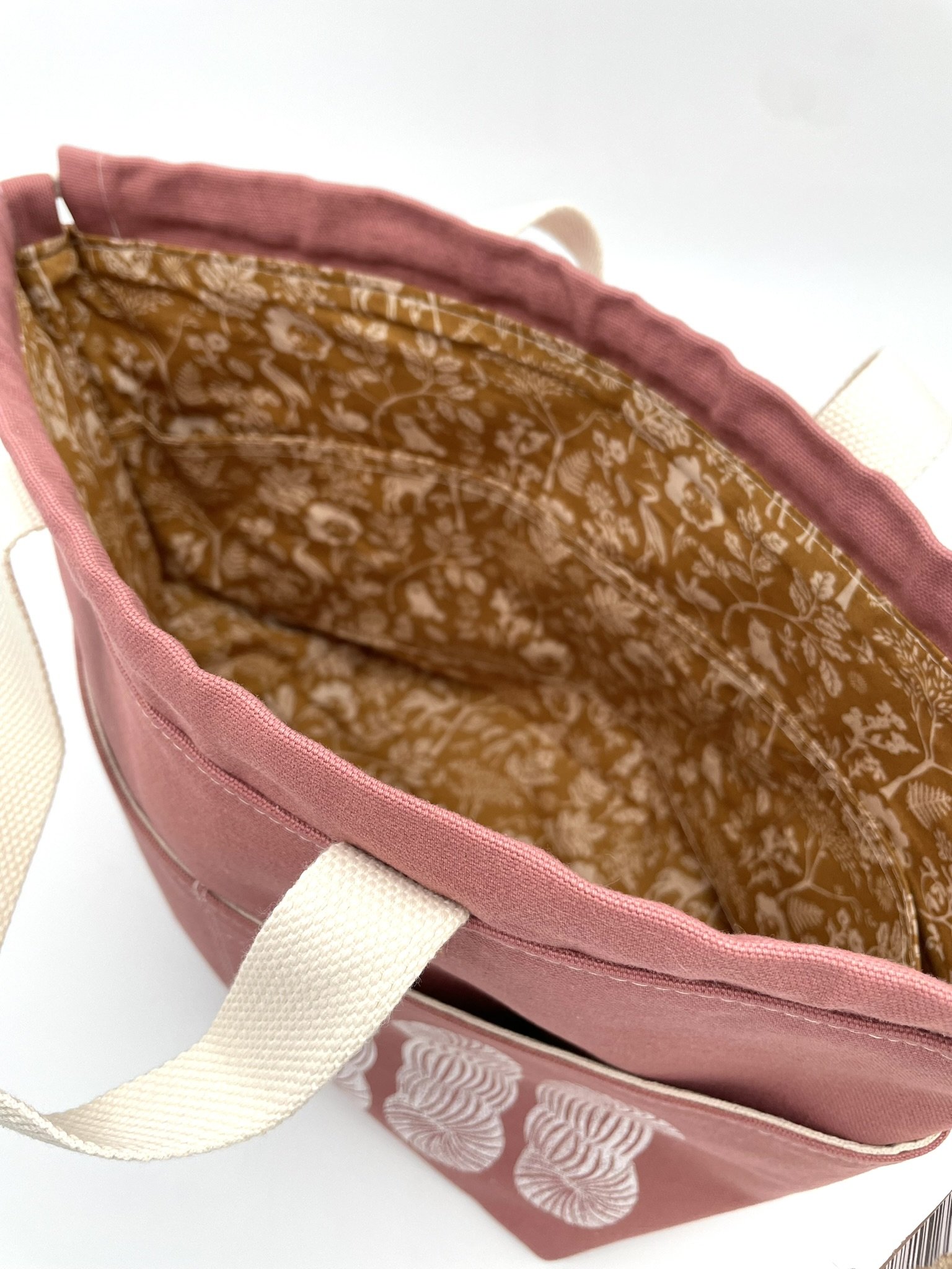 Close-up of inside pockets in large pink Puff Stitch project bag