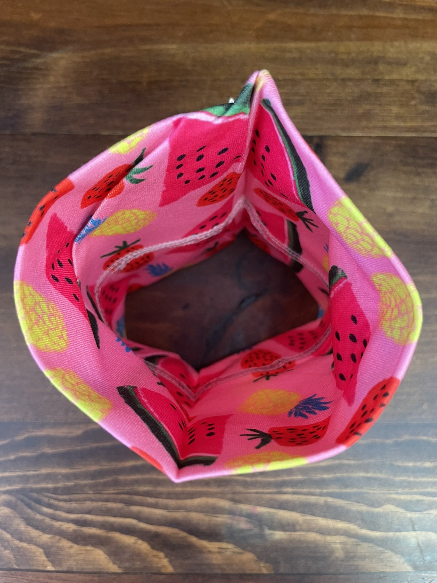 Inside view of Fox & Pine yarn sweater in watermelon print, showing the interior details of the fabric.