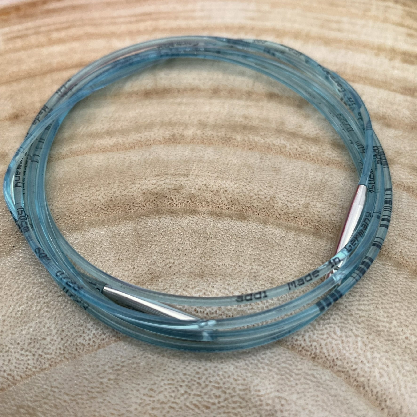 Close-up of addiClick 60-inch cord removed from the package, showing the smooth join points.