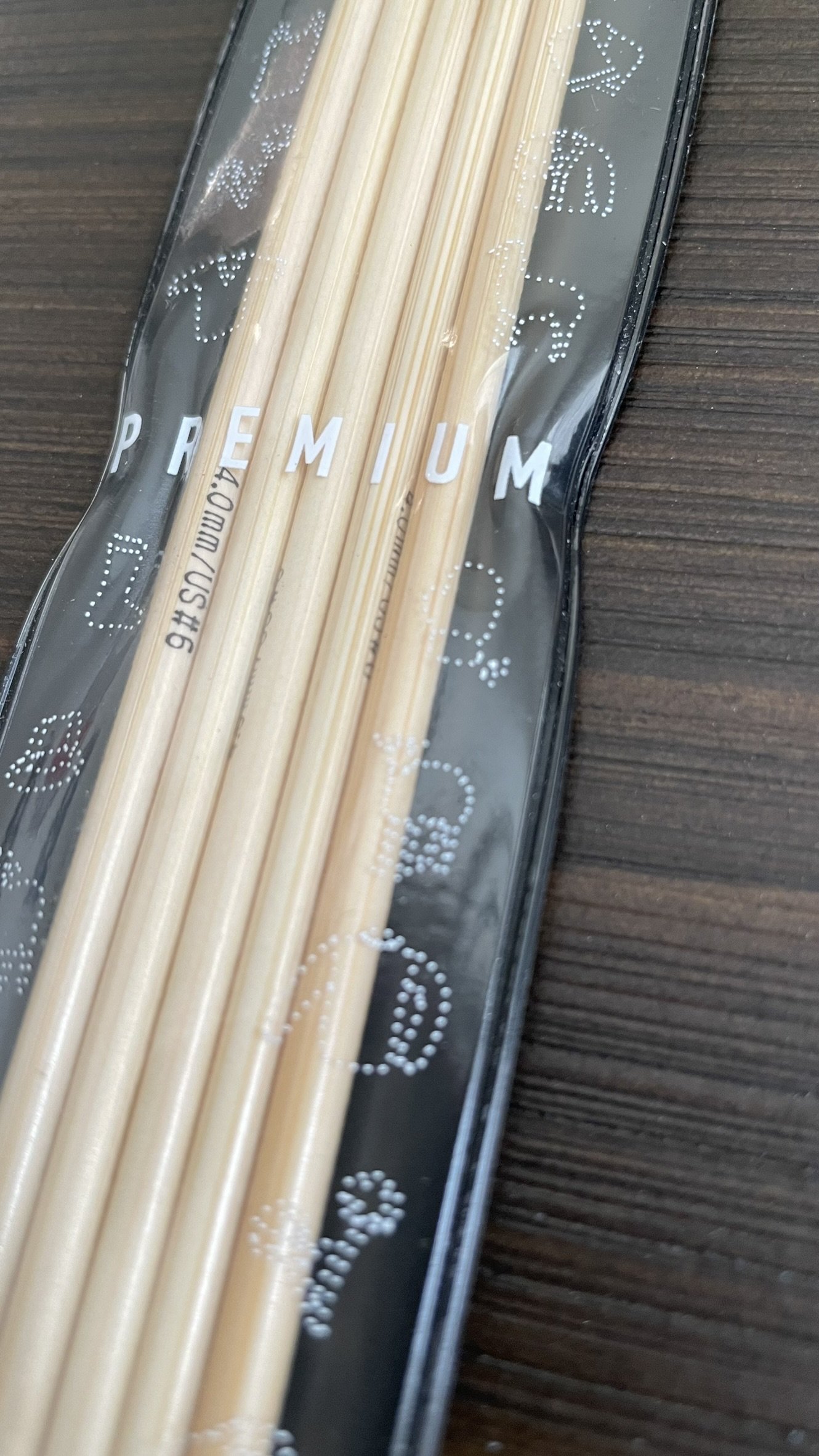 Close-up view of Addi 8-inch bamboo double-pointed needles showcasing smooth finish.