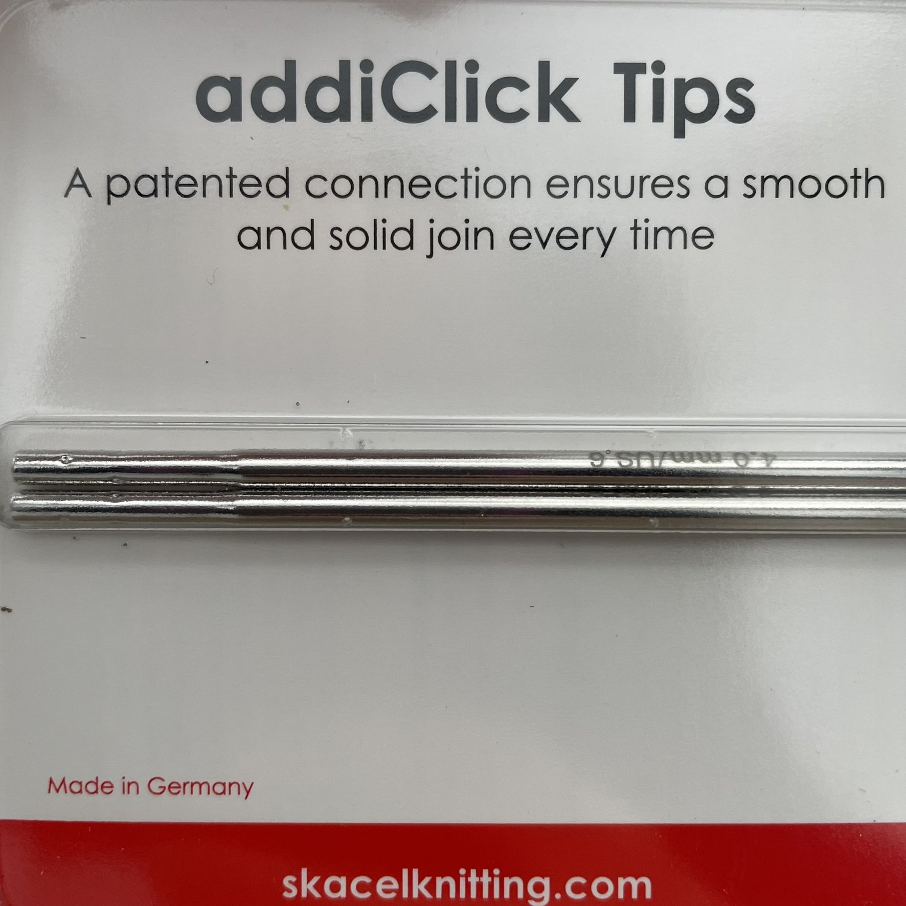 Close-up of the AddiClick knitting tips packaging, highlighting the AddiClick name and branding.
