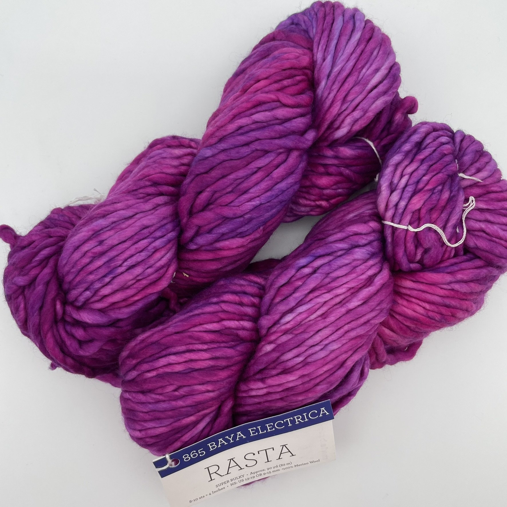 Malabrigo Rasta yarn in Belgian Chocolate colorway, a rich deep brown super bulky merino wool skein for knitting or crocheting.